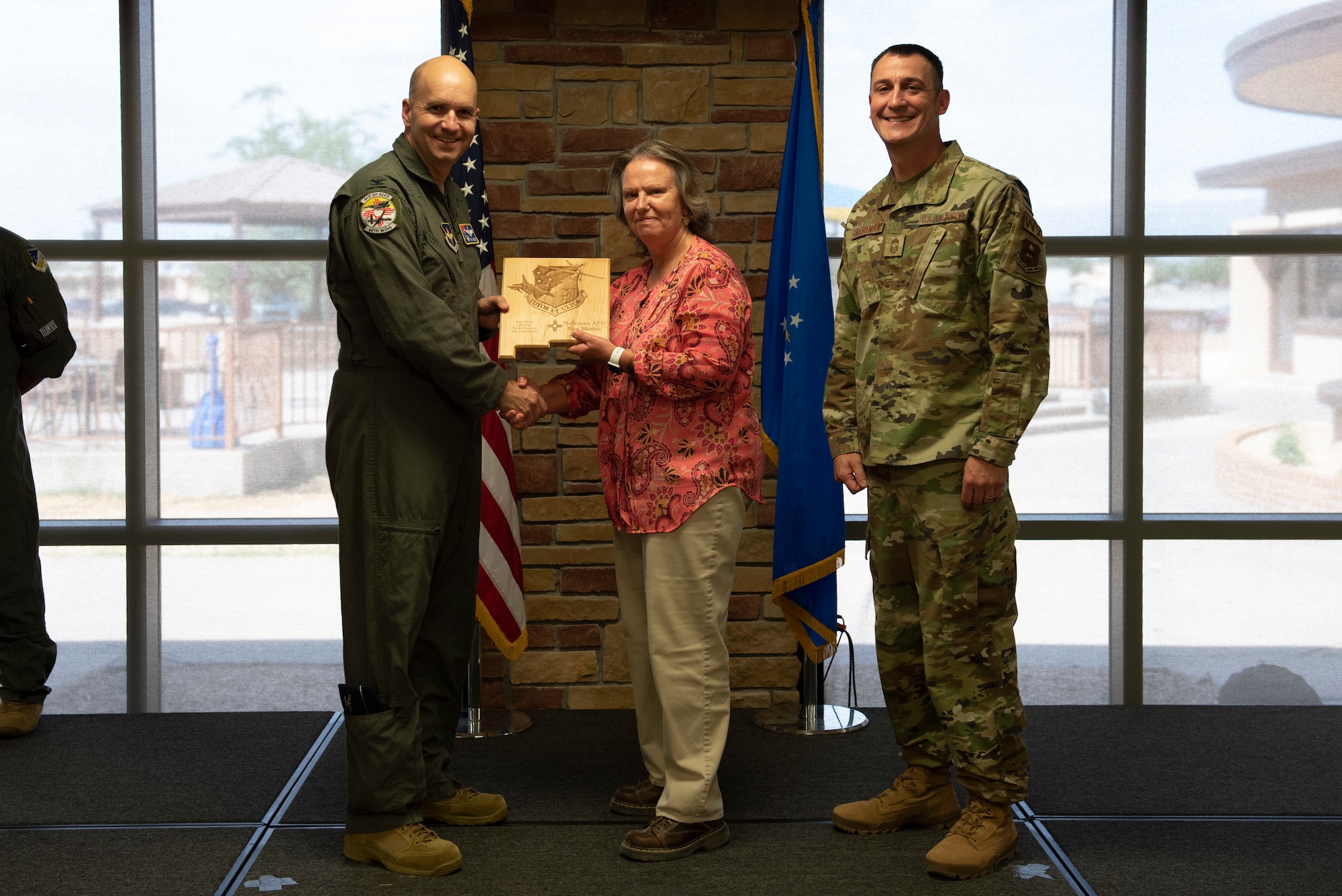 Ms. Denise Harmon, from the 49th Logistics Readiness Squadron, accepts the Civilian Category II (Supervisory) of the Quarter Award during the 49th Wing’s 1st quarter awards ceremony, June 10, 2022, on Holloman Air Force Base, New Mexico.