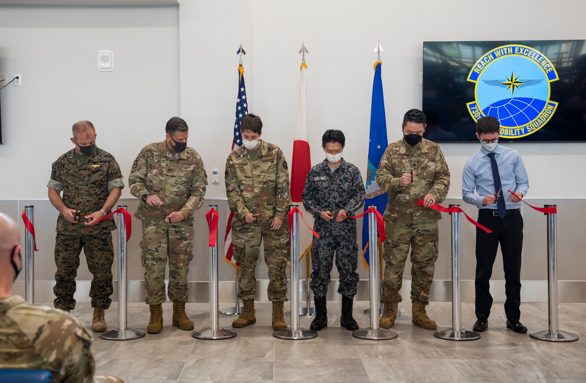 The Yokota Air Base community celebrated the opening of a new Air Mobility Command passenger terminal on Monday, June 13.