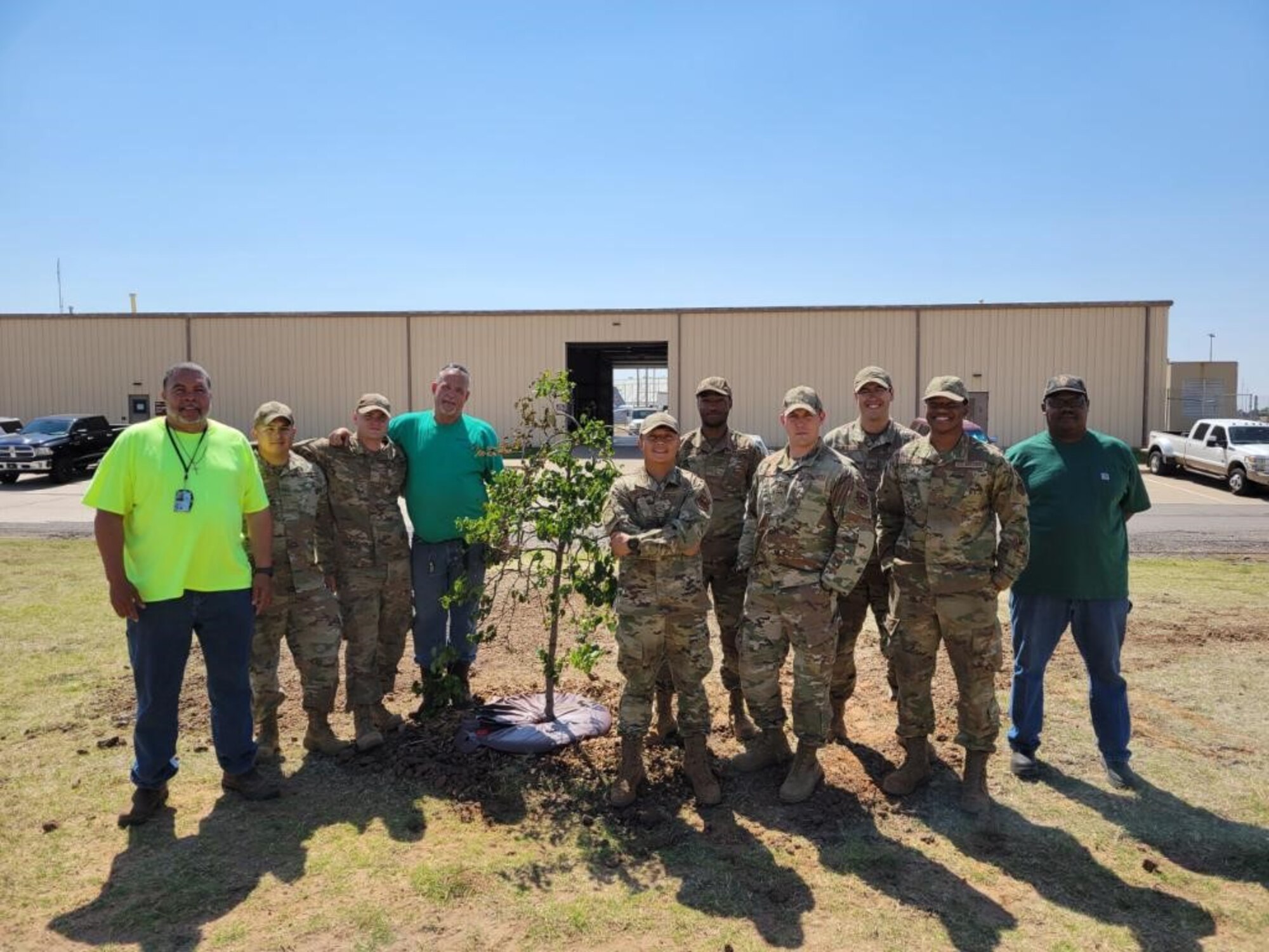 97th CES Dirt Boyz plant memorial tree.