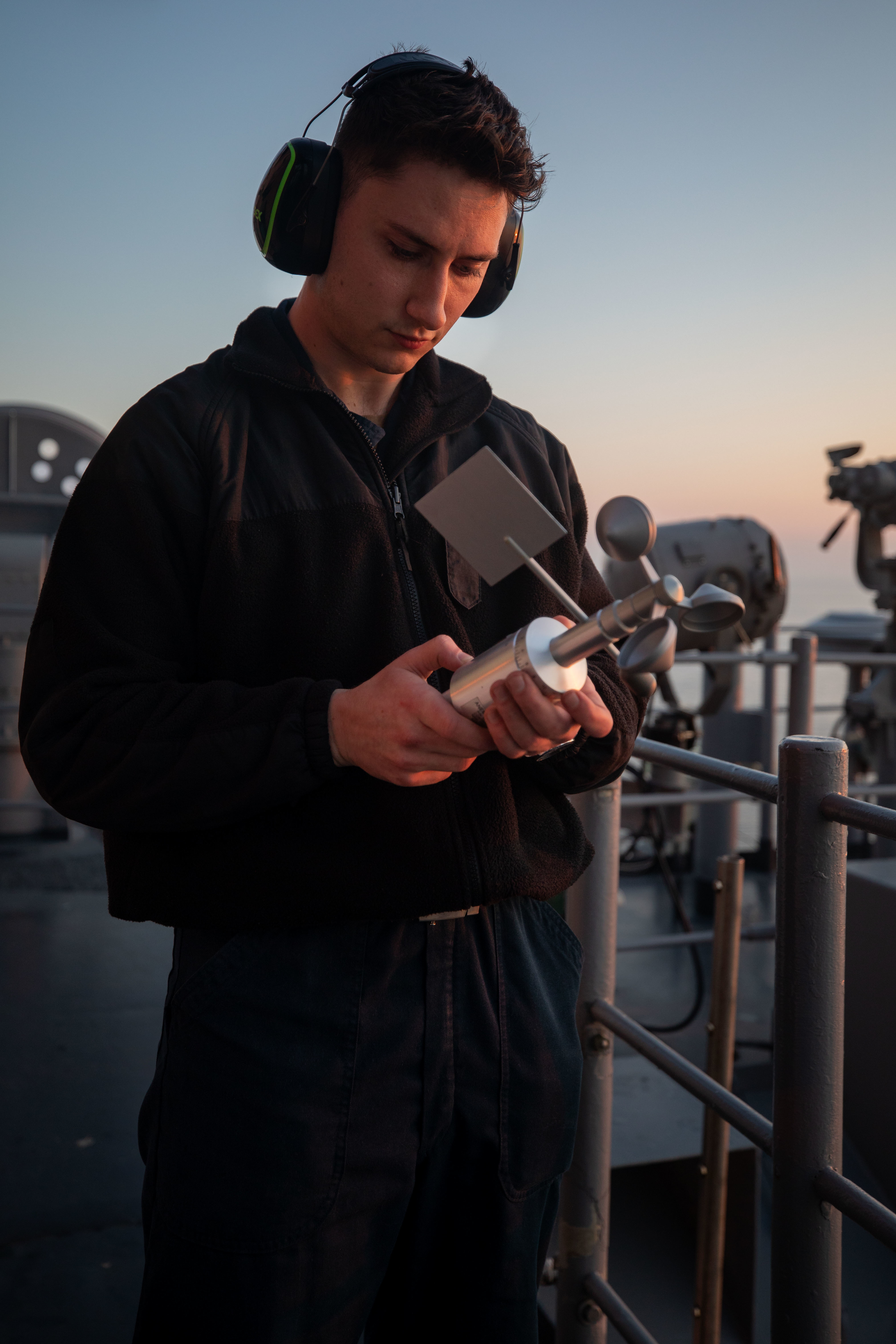 U.S. Navy Aerographer’s Mate Airman Chase Dublin holds a handheld anemometer used to gather wind speed and weather information aboard the Wasp-class amphibious assault ship USS Kearsarge (LHD 3), during exercise BALTOPS 22, June 10, 2022. BALTOPS 22 is the premier maritime-focused exercise in the Baltic Region. The exercise, led by U.S. Naval forces Europe-Africa, and executed by Naval Striking and Support Forces NATO, provides a unique training opportunity to strengthen combined response capabilities critical to preserving freedom of navigation and security in the Baltic Sea. (U.S. Marine Corps photo by Cpl. Yvonna Guyette)