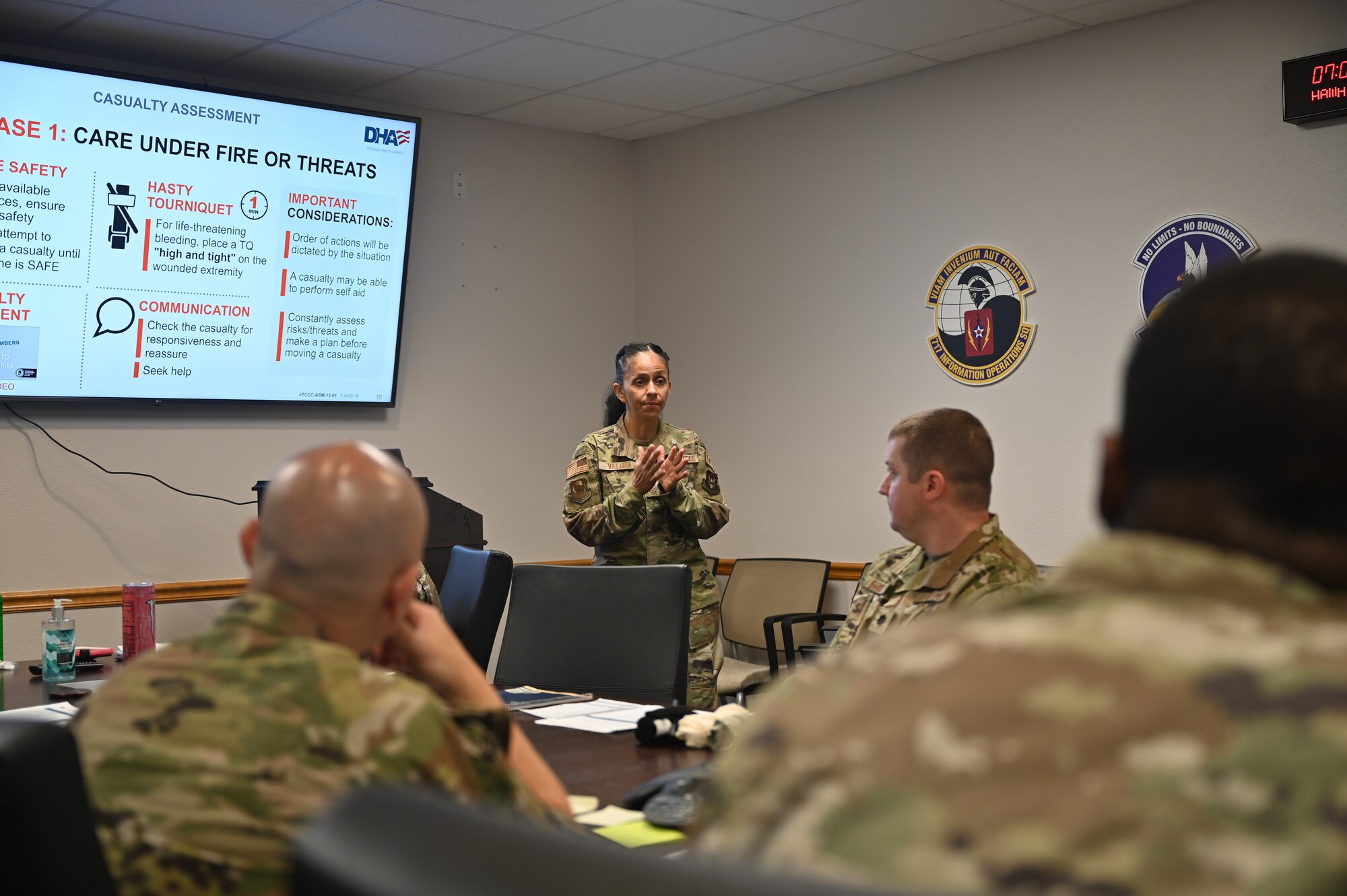 Master Sgt. Jeanett Vielman, 960th Cyberspace Wing inspection team supervisor, leads a tactical combat casualty care training class June 4, 2022 at Joint Base San Antonio-Chapman Training Annex, Texas.