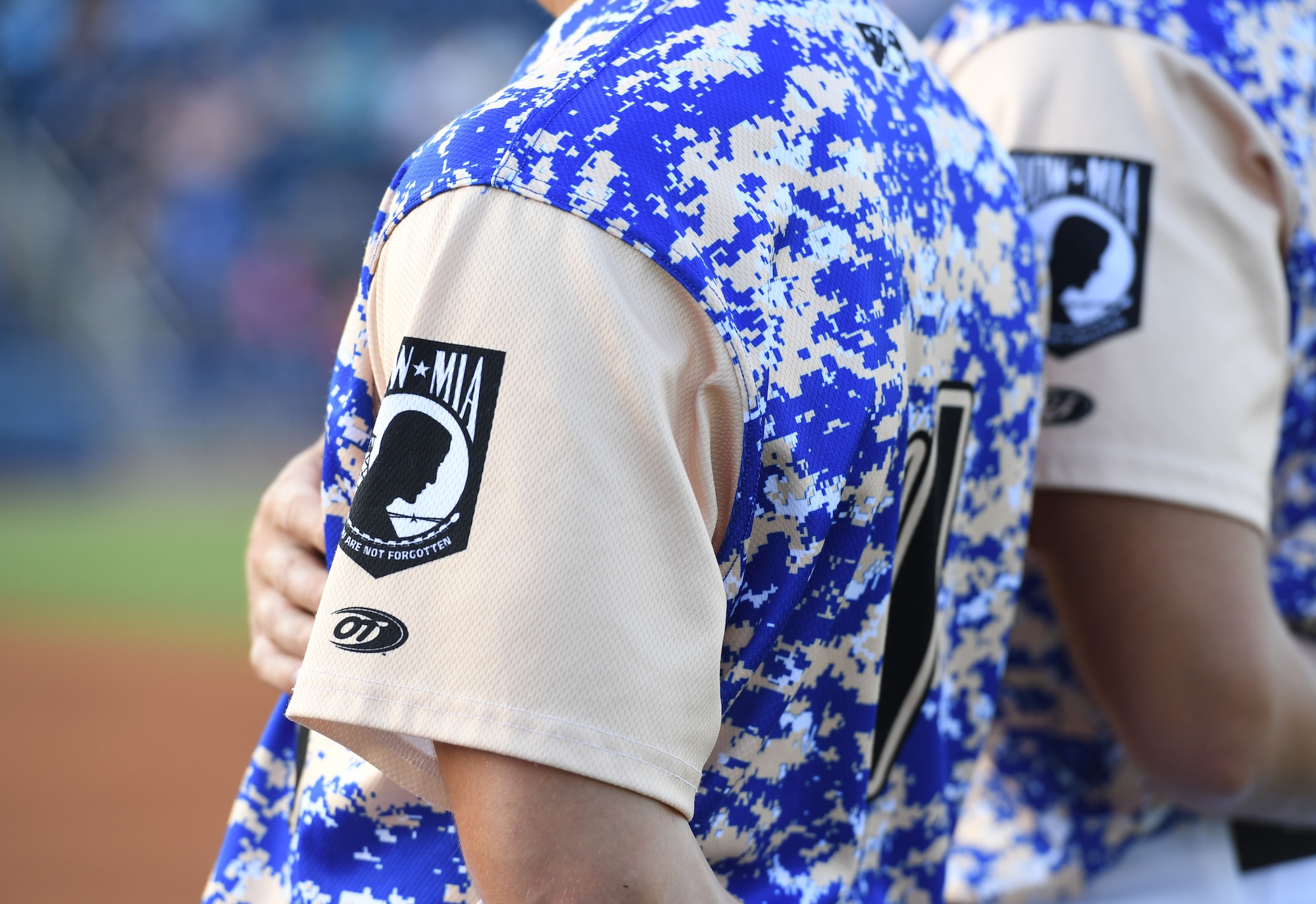 Biloxi Shuckers baseball players wear a military appreciation jersey during the Biloxi Shuckers Minor League Baseball game in Biloxi, Mississippi, June 11, 2022. Members from Keesler Air Force Base participated in the pre-game festivities as the Shuckers hosted a military appreciation night where service members also received free tickets. (U.S. Air Force photo by Kemberly Groue)