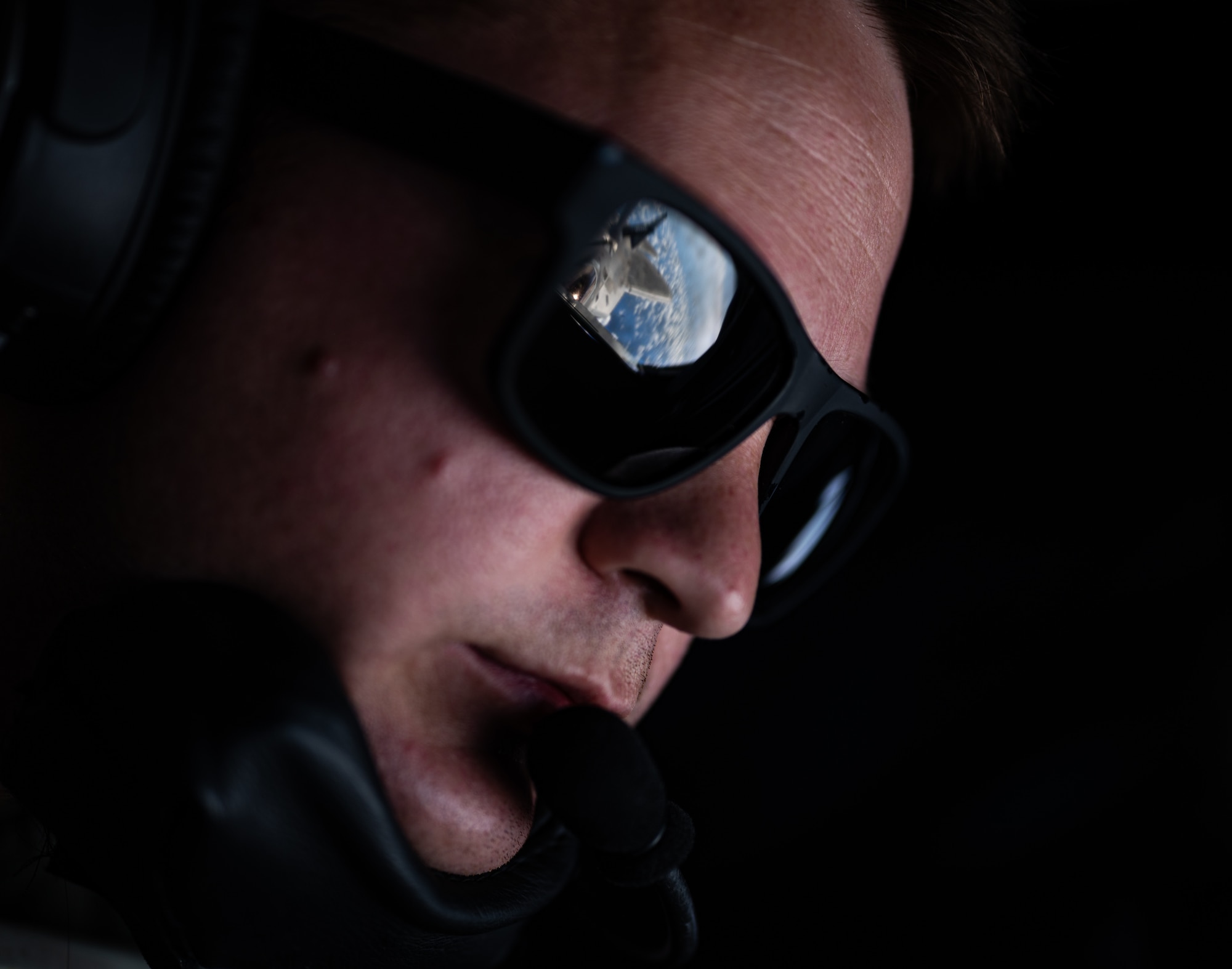 Airman Conducts aerial refueling.