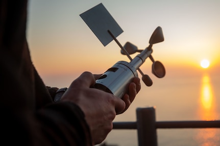 U.S. Navy Aerographer’s Mate Airman Chase Dublin holds a handheld anemometer used to gather wind speed and weather information aboard the Wasp-class amphibious assault ship USS Kearsarge (LHD 3), during exercise BALTOPS 22, June 10, 2022. BALTOPS 22 is the premier maritime-focused exercise in the Baltic Region. The exercise, led by U.S. Naval forces Europe-Africa, and executed by Naval Striking and Support Forces NATO, provides a unique training opportunity to strengthen combined response capabilities critical to preserving freedom of navigation and security in the Baltic Sea. (U.S. Marine Corps photo by Cpl. Yvonna Guyette)