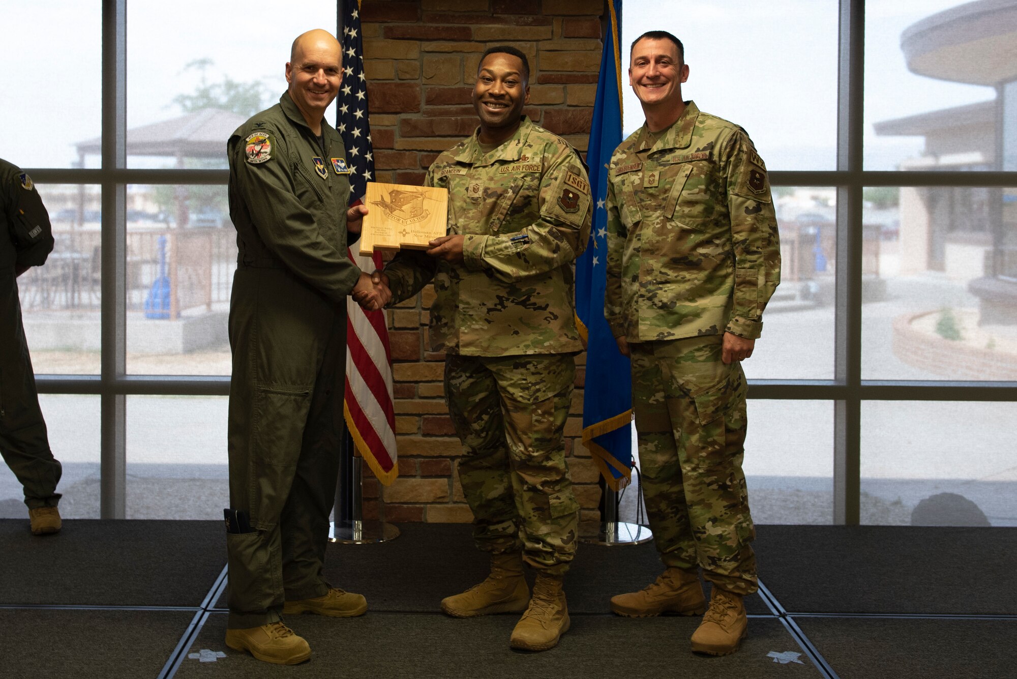 Master Sgt. Daniel Brandon, from the 49th Civil Engineer Squadron, accepts the First Sergeant of the Quarter Award during the 49th Wing’s 1st quarter awards ceremony, June 10, 2022, on Holloman Air Force Base, New Mexico.