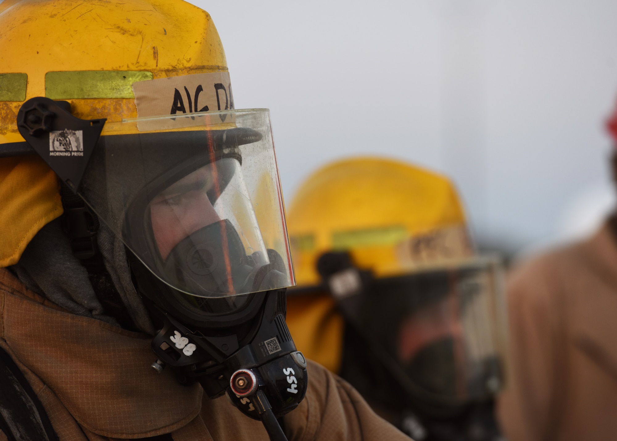 U.S. Air Force Airman 1st Class Payton Davis, 312 Training Squadron student, watches as a gas cylinder fire ignites during a training assessment, at Goodfellow Air Force Base, Texas, June 9, 2022. The students were evaluated on their ability to properly control the threat. (U.S. Air Force photo by Airman 1st Class Zachary Heimbuch)