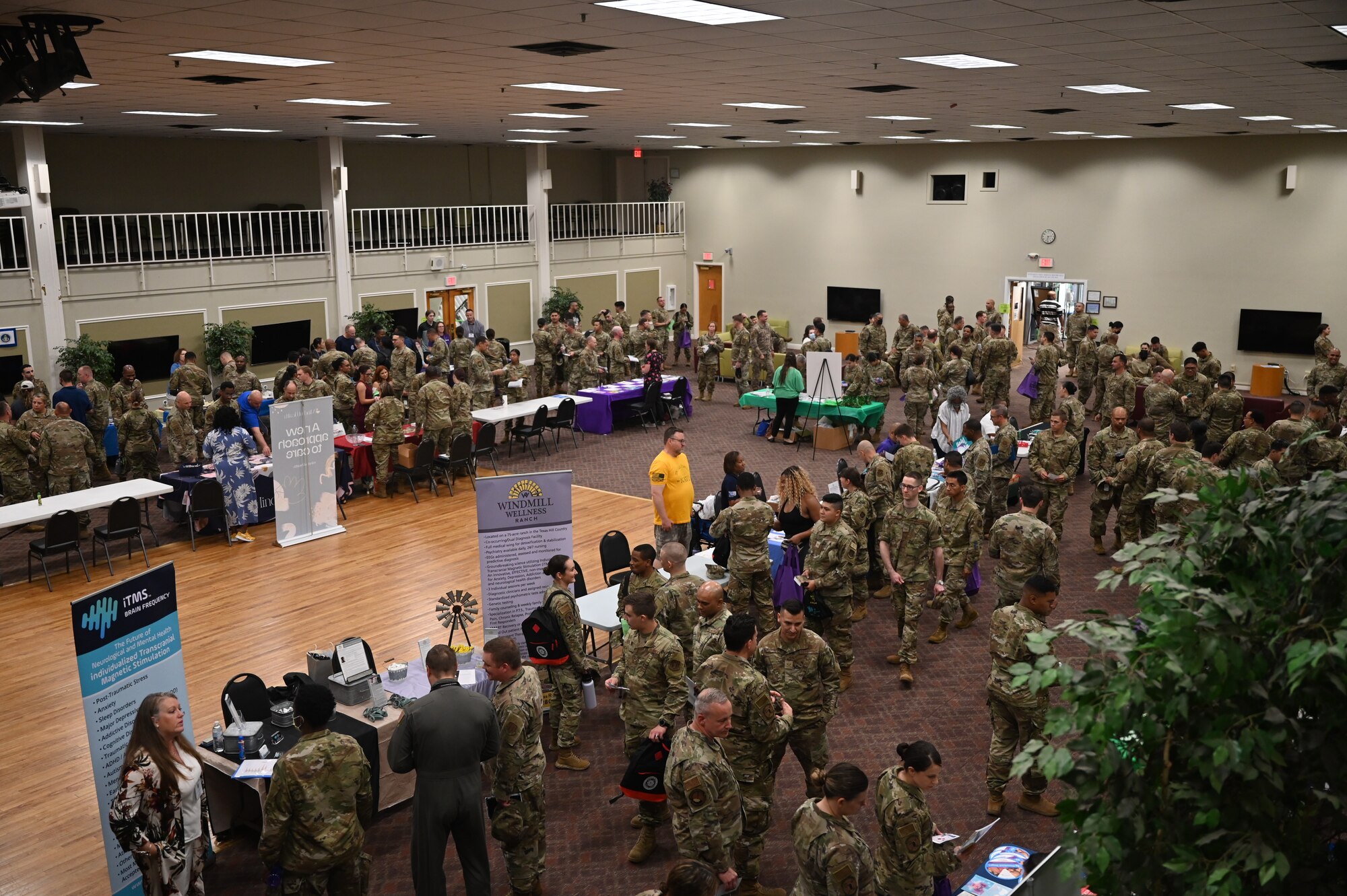 Reserve Citizen Airmen visit community organization information booths during the 960th Cyberspace Wing Mental Health & Resiliency Fair May 14, 2022, at Joint Base San Antonio-Lackland, Texas.