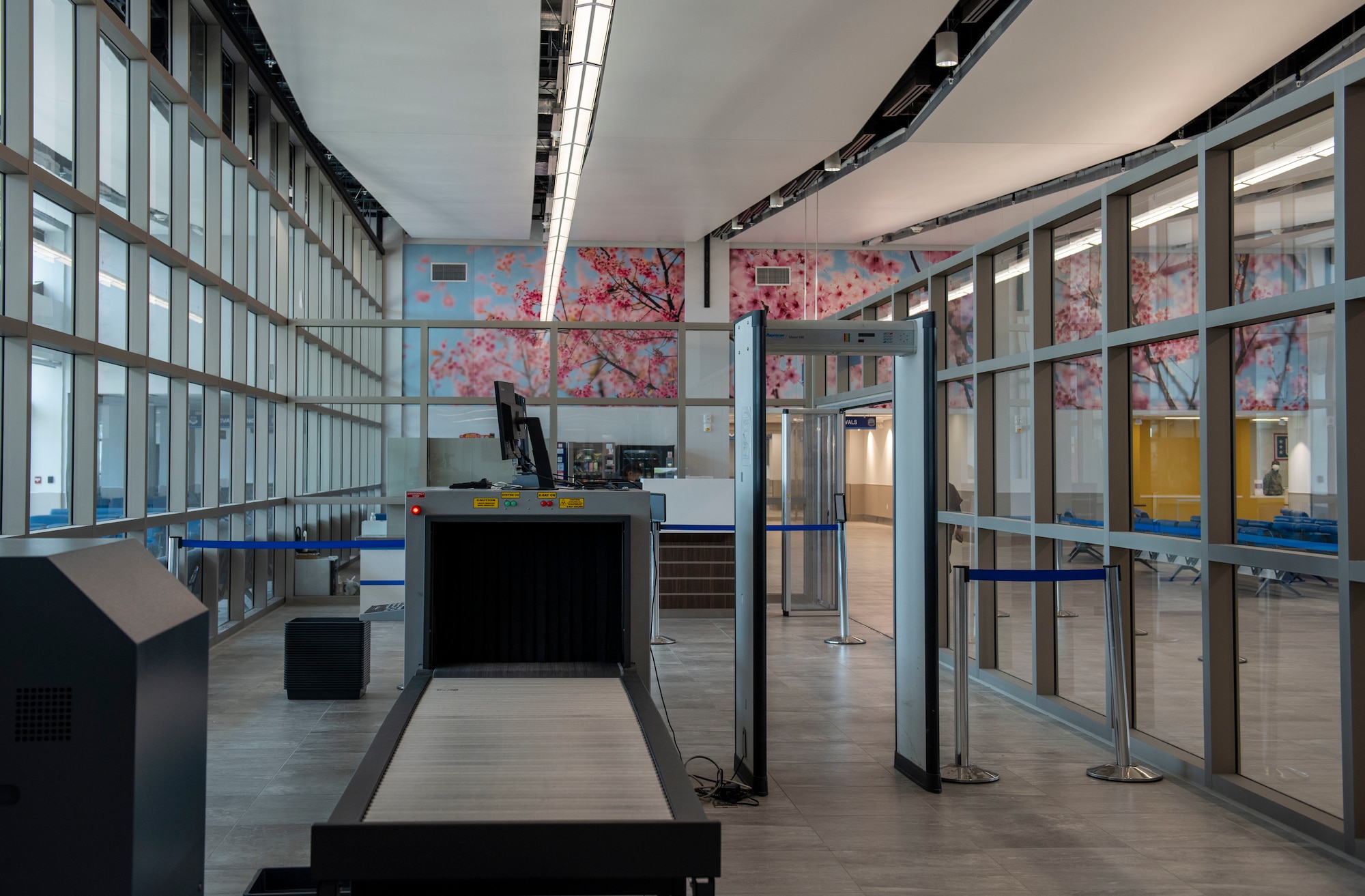 Attendees explore the Yokota Passenger Terminal after a ribbon cutting ceremony, June 13, 2022, at Yokota Air Base, Japan. The project spanned nearly seven years, with planning starting in late 2015, construction starting in June of 2020 and completion in June of 2022.