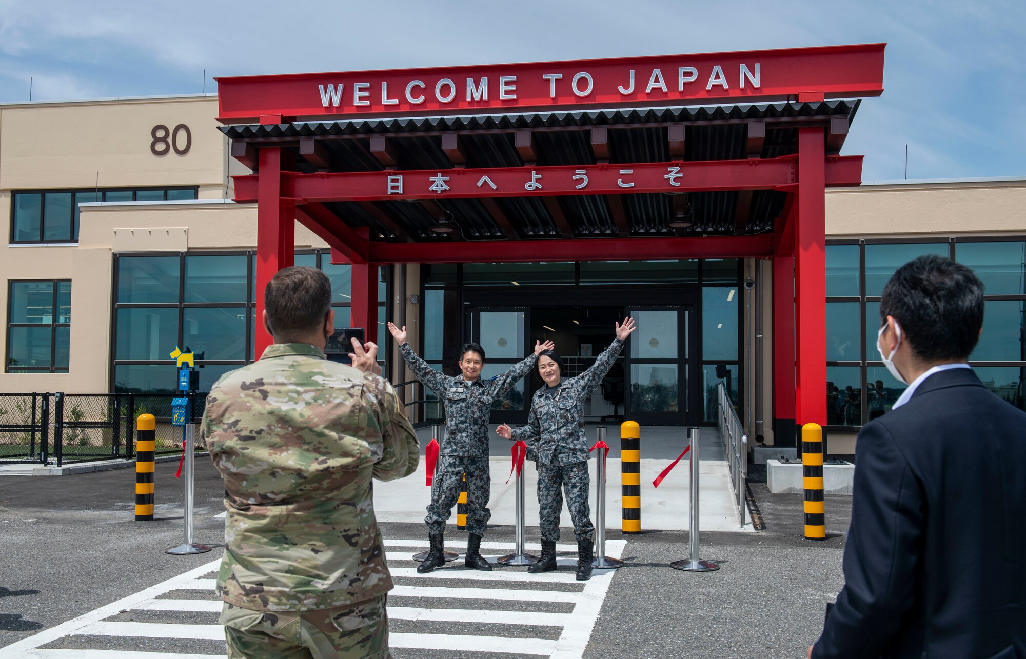 The Yokota Air Base community celebrated the opening of a new Air Mobility Command passenger terminal on Monday, June 13.