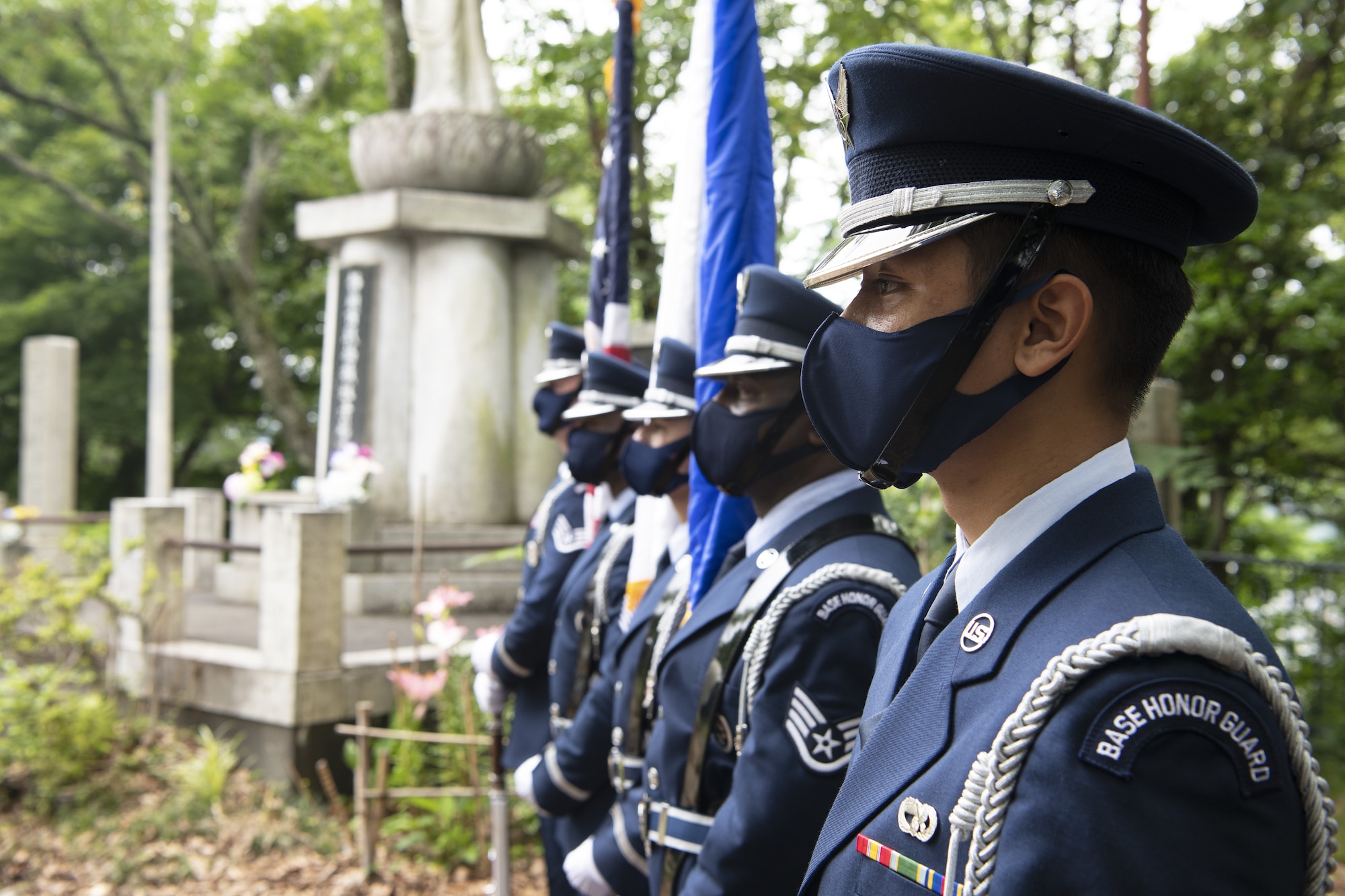 Honor Guard members assigned to Yokota Air Base, Japan, stand at parade rest prior to the U.S.-Japan Joint Memorial Service June 11, 2022, at Mt. Shizuhata, Shizuoka city, Japan. The memorial service provided participants the opportunity to honor those who lost their lives during a World War II air raid on June 20, 1945. During the raid, two U.S. Army Air Forces B-29 Superfortresses collided mid-air over Shizuoka City, resulting in the death of 23 Airmen on board the aircraft. Representatives of the U.S. Air Force’s Yokota Air Base, Japan Self-Defense Force, and Shizuoka City rendered their respects to the Airmen and Japanese civilians who lost their lives as a result of the tragedy. (U.S. Air Force photo by Tech. Sgt. Christopher Hubenthal)