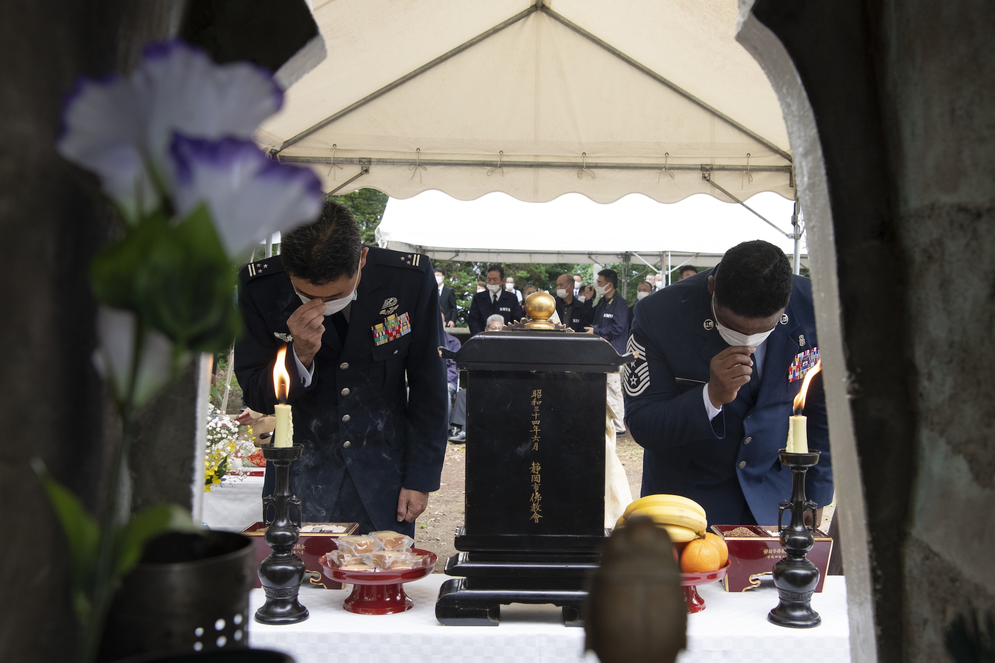 Japan Air Self-Defense Forces Col Kyouichi Takeda, left, Shizuoka Local Cooperation Office chief, and Chief Master Sgt. Jerry Dunn, 374th Airlift Wing command chief, participate in an incense offering ceremony during a U.S.-Japan Joint Memorial Service June 11, 2022, at Mt. Shizuhata, Shizuoka city, Japan. The memorial service provided participants the opportunity to honor those who lost their lives during a World War II air raid on June 20, 1945. During the raid, two U.S. Army Air Forces B-29 Superfortresses collided mid-air over Shizuoka City, resulting in the death of 23 Airmen on board the aircraft. Representatives of the U.S. Air Force’s Yokota Air Base, Japan Self Defense Force, and Shizuoka City rendered their respects to the Airmen and Japanese civilians who lost their lives as a result of the tragedy, and reflected on the strong alliance the U.S. and Japan have forged since the end of World War II. (U.S. Air Force photo by Tech. Sgt. Christopher Hubenthal)