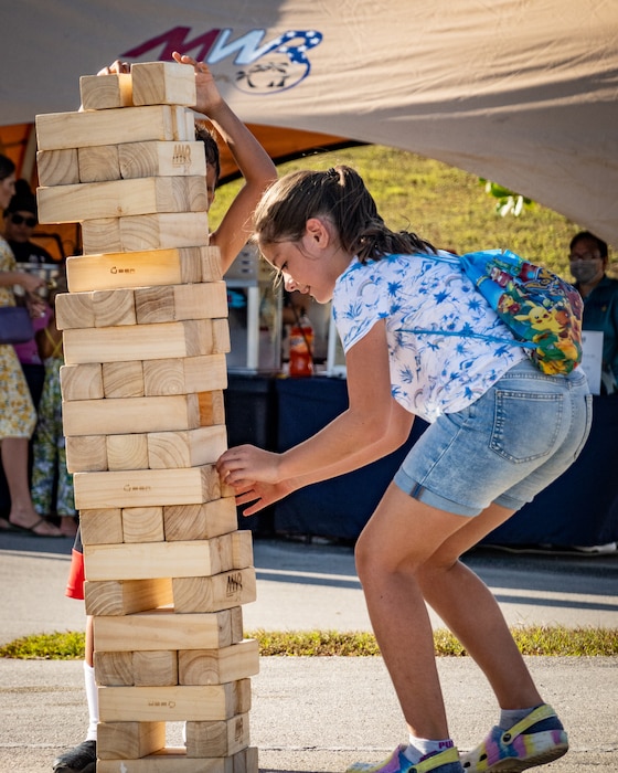 NAVAL BASE GUAM (May 27, 2022) - Families from U.S. Naval Base Guam (NBG) and throughout the community attended the first-ever Memorial Day Jump House Carnival at the Charles King Fitness Center compound, onboard NBG May 27 - 28. 

The carnival included several bouncy houses for children of all ages, various games, food trucks, and a featured an outdoor movie for all to enjoy. 

(U.S. Navy Photos by LSSCS Christian Dadino)