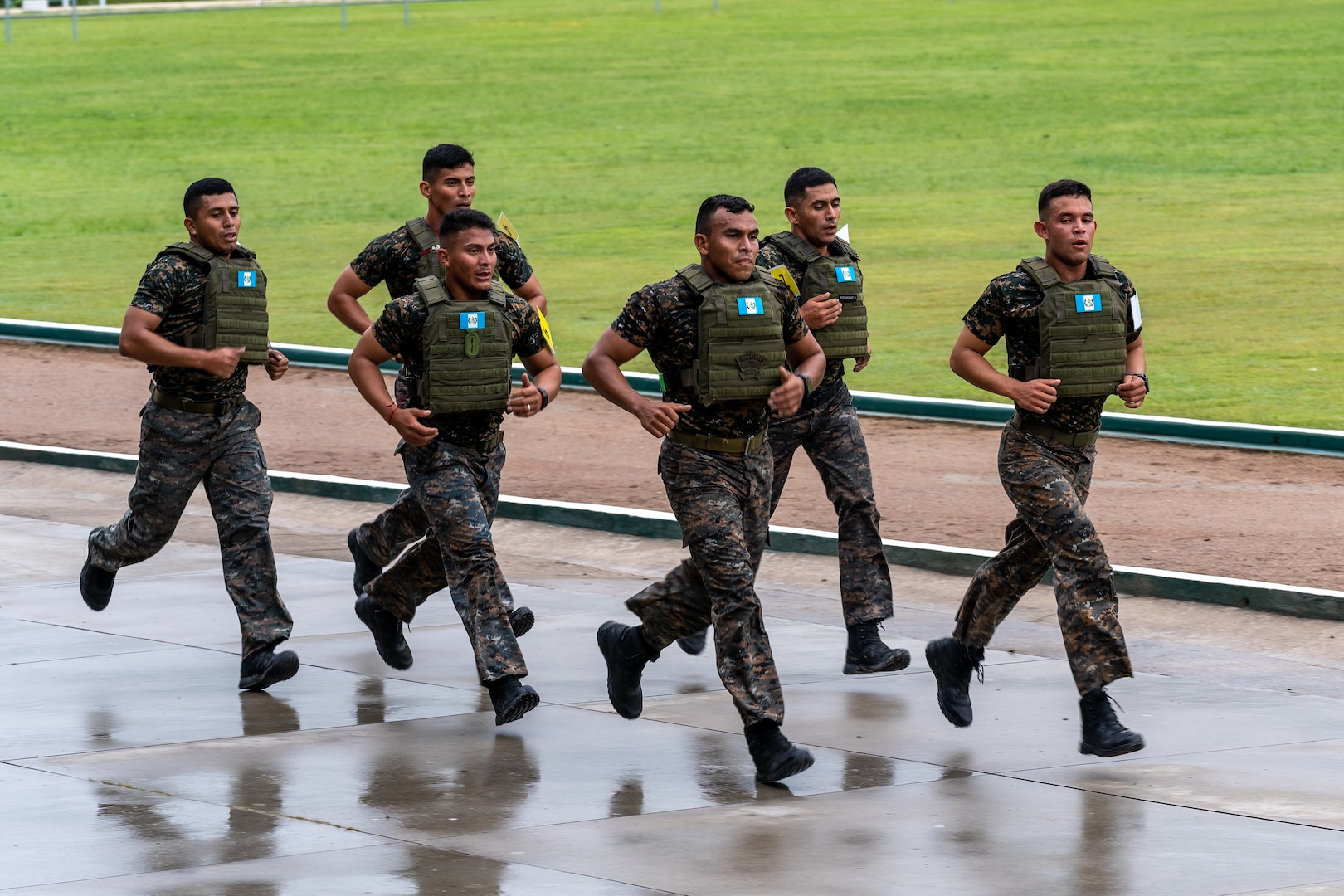 Guatemala team members run as part of the first event for Fuerzas Comando 2022, the Physical Training Test, on June 13, 2022, in Tegucigalpa, Honduras.