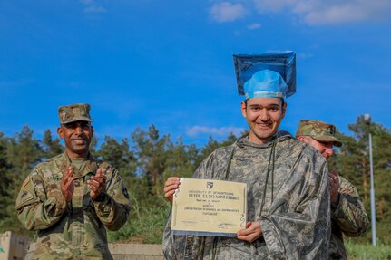 456th Medical Company Area Support honors Soldier with impromptu commencement ceremony during Defender 22