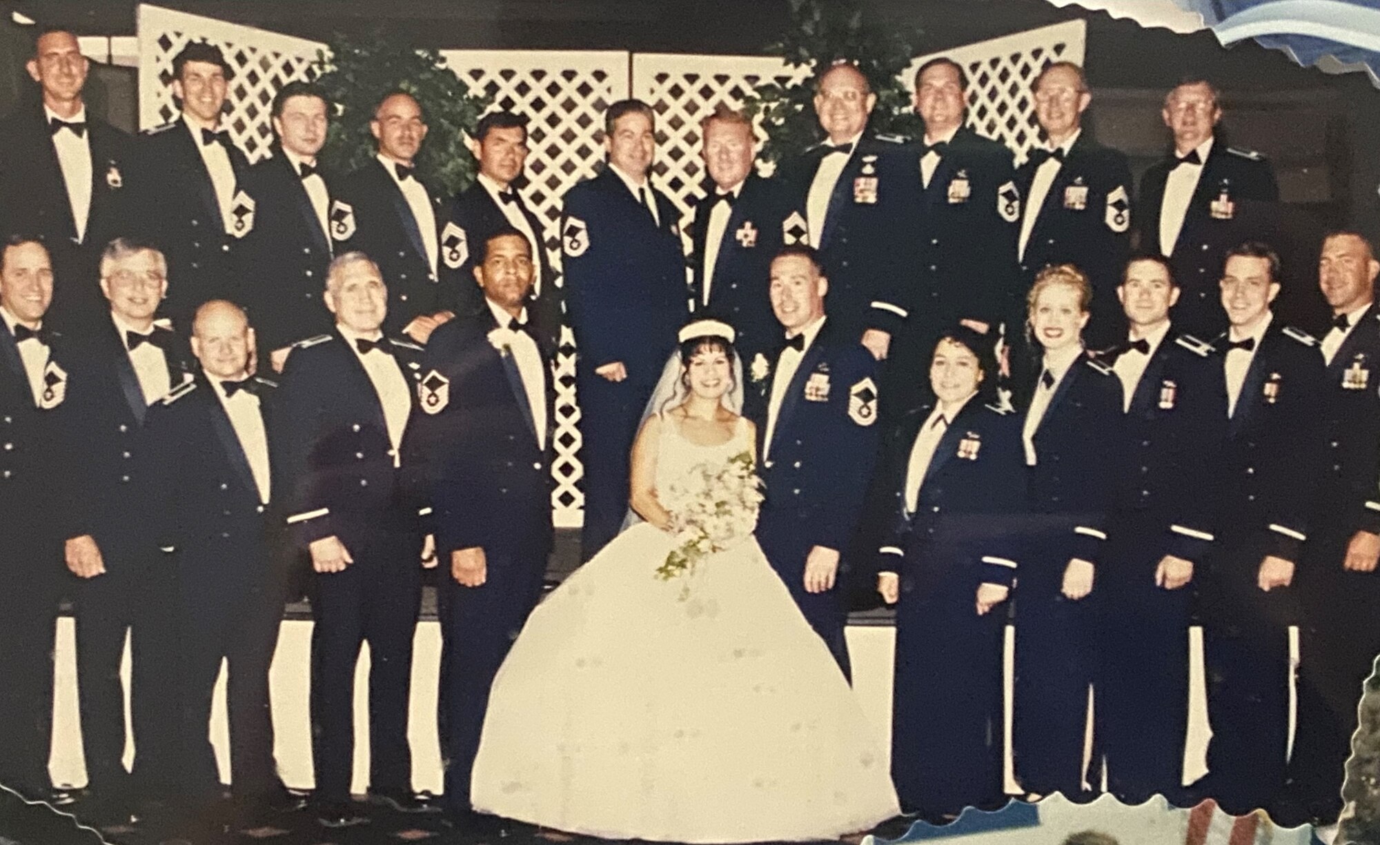 SMSgt. Grant Schaber and Christina Schaber pose with fellow military members and friends during their June 23, 2000 wedding in Albuquerque, N.M.