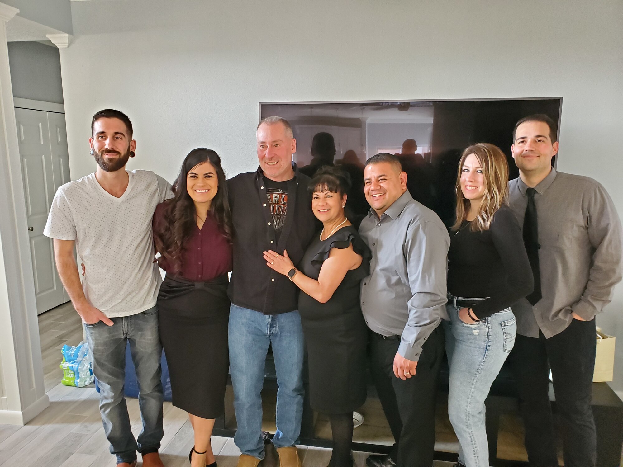 Grant and Christina Schaber pose with their sons and daughters during a January 2020 family event. (Left to right) Michael Schaber, Holly Griego, Grant Schaber, Christina Schaber, Vicente Limon, Asia Kilgore, and Joshua Schaber.