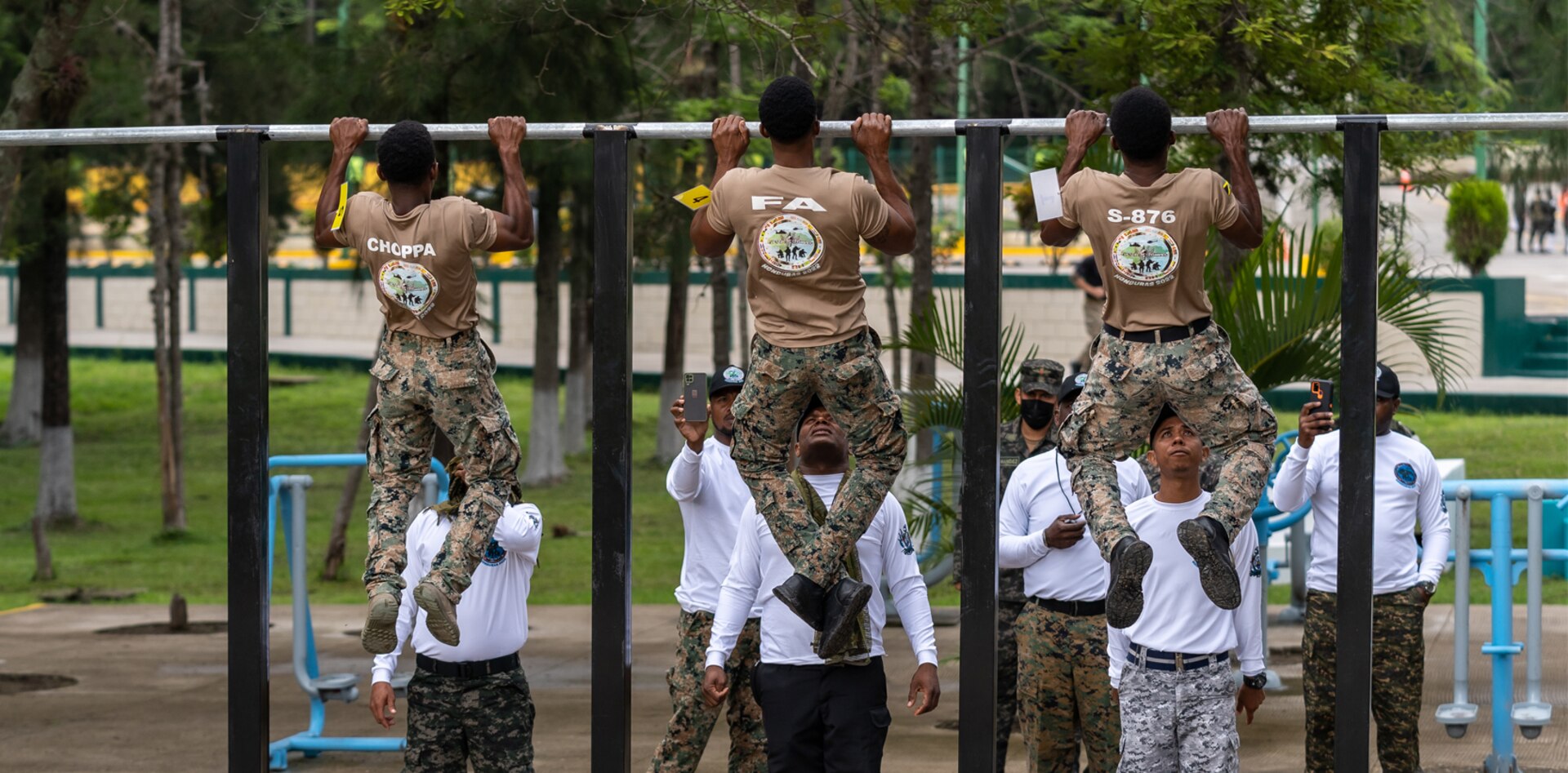 Jamaica team members perform the pullup portion of the Physical Training Test as part of the first event for Fuerzas Comando 2022, on June 13, 2022, in Tegucigalpa, Honduras.