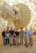 Photo of MET Sustainment course attendees pose with instructors for a group shot in front of a MET.