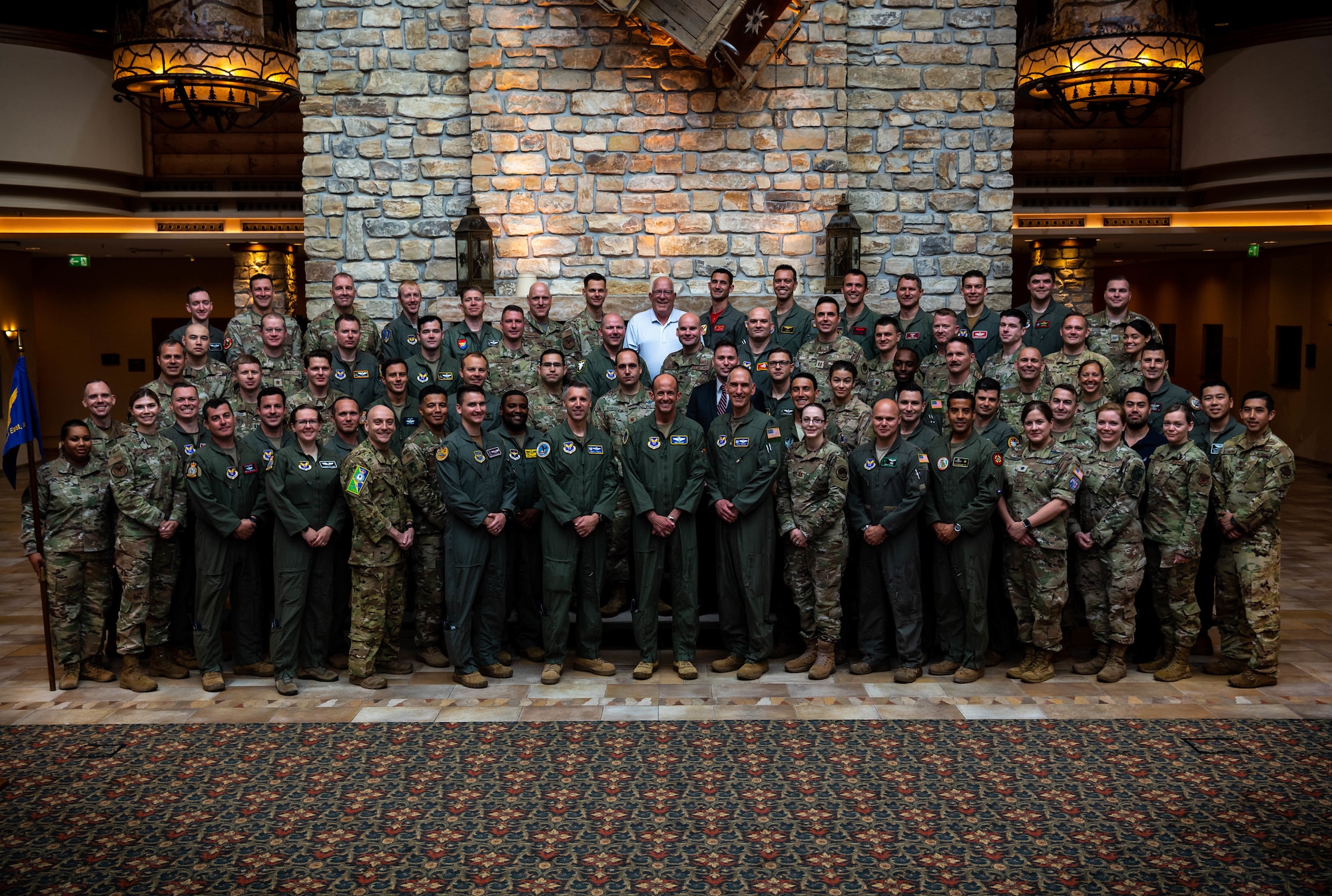 Members of the Military Personnel Exchange Program annual forum stand for a photo at Edelweiss Lodge and Resort, in Garmisch-Partenkirchen, Germany.