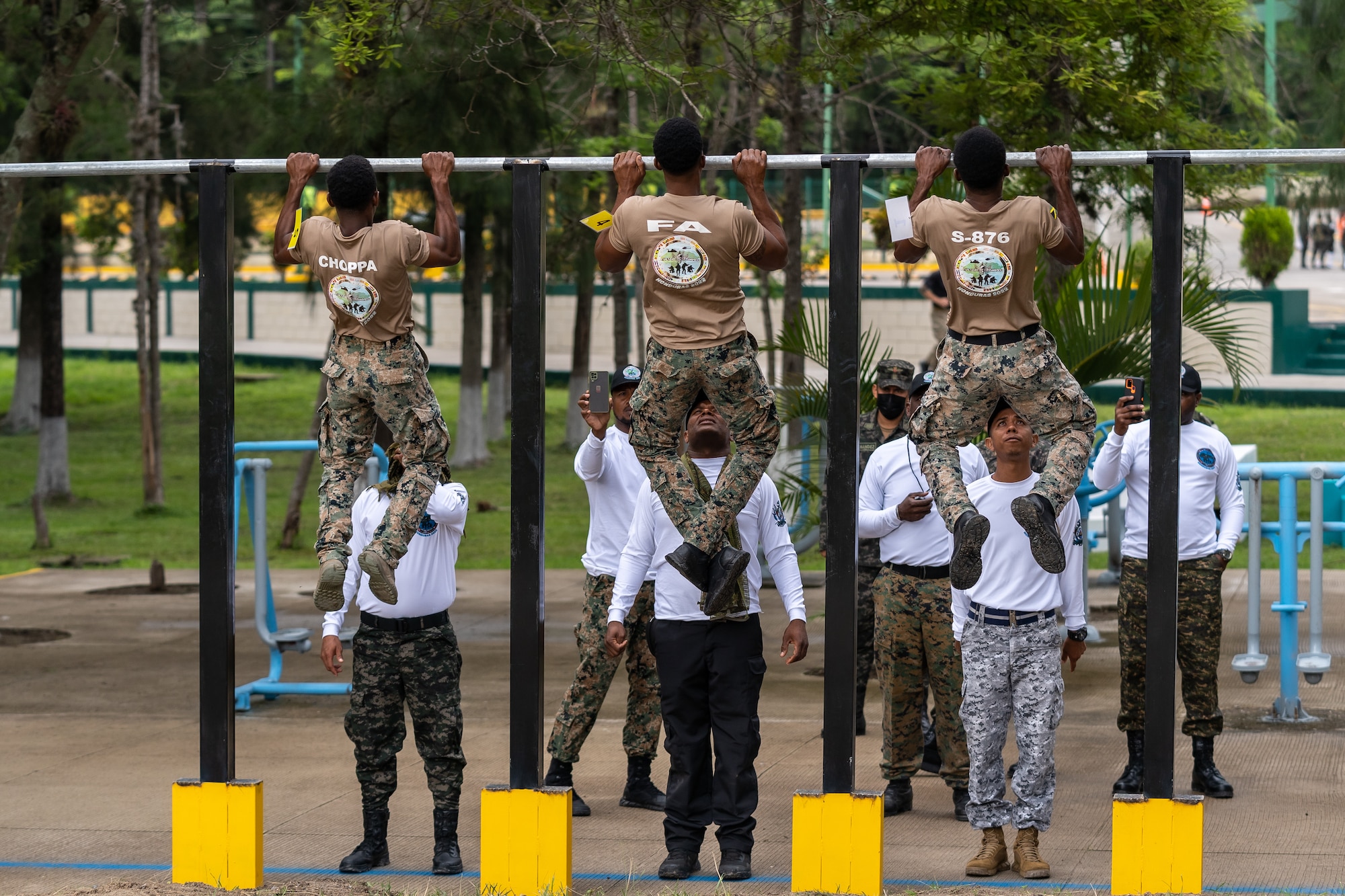 Jamaica team members perform the pullup portion of the Physical Training Test as part of the first event for Fuerzas Comando 2022, on June 13, 2022, in Tegucigalpa, Honduras.