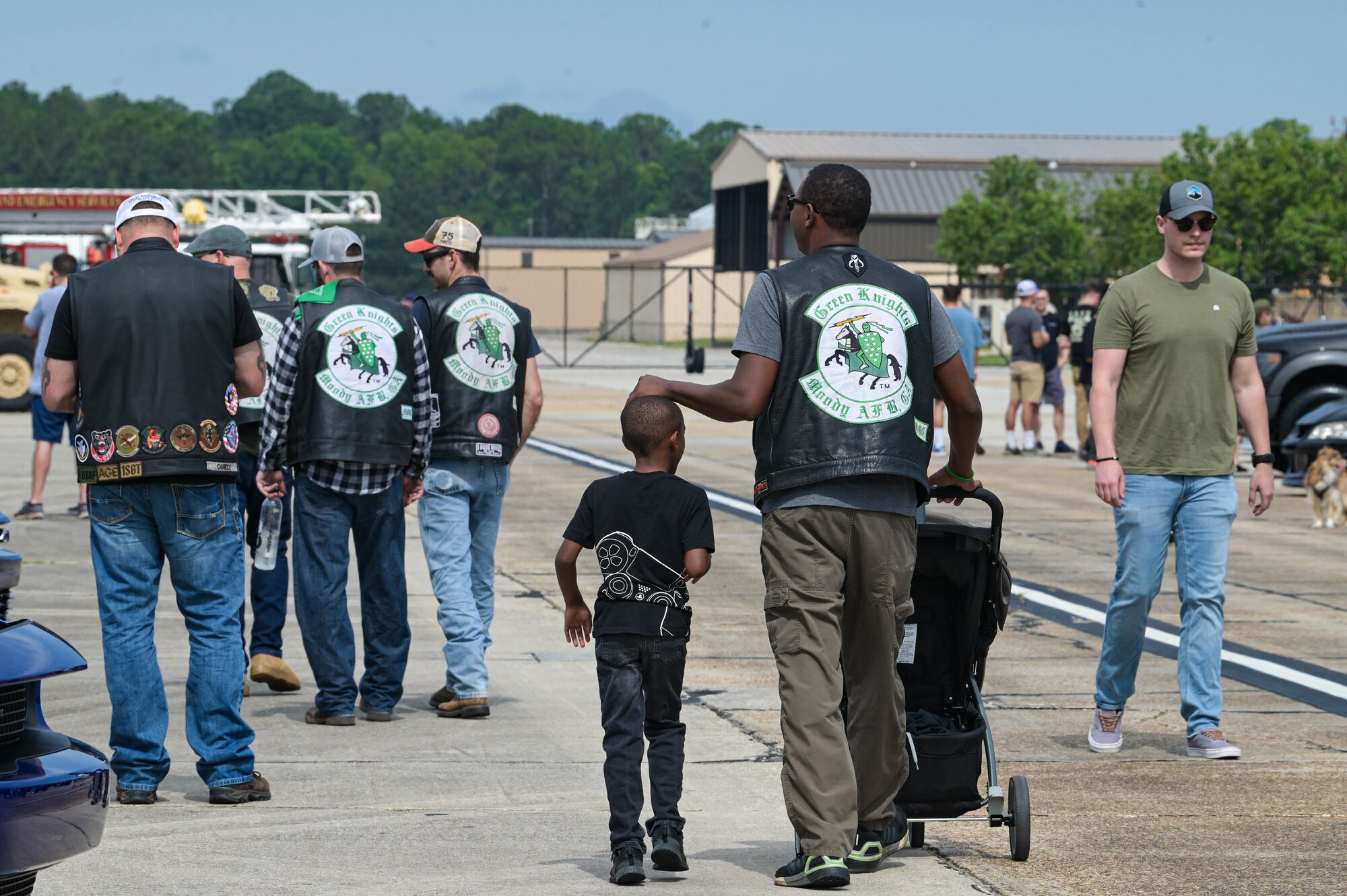 U.S. Air Force Airmen and their families attend a car show at Moody Air Force Base, Georgia, June 11, 2022. This event was an opportunity to show off their passion for trucks, cars and motorcycles. (U.S. Air Force photo by Senior Airman Rebeckah Medeiros)