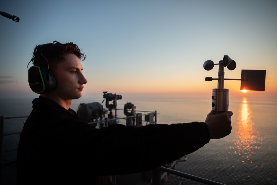 U.S. Navy Aerographer’s Mate Airman Chase Dublin uses a handheld anemometer to gather wind speed and weather information aboard the Wasp-class amphibious assault ship USS Kearsarge during exercise BALTOPS 22, June 10, 2022. BALTOPS 22 is the premier maritime-focused exercise in the Baltic Region. The exercise, led by U.S. Naval forces Europe-Africa, and executed by Naval Striking and Support Forces NATO, provides a unique training opportunity to strengthen combined response capabilities critical to preserving freedom of navigation and security in the Baltic Sea.