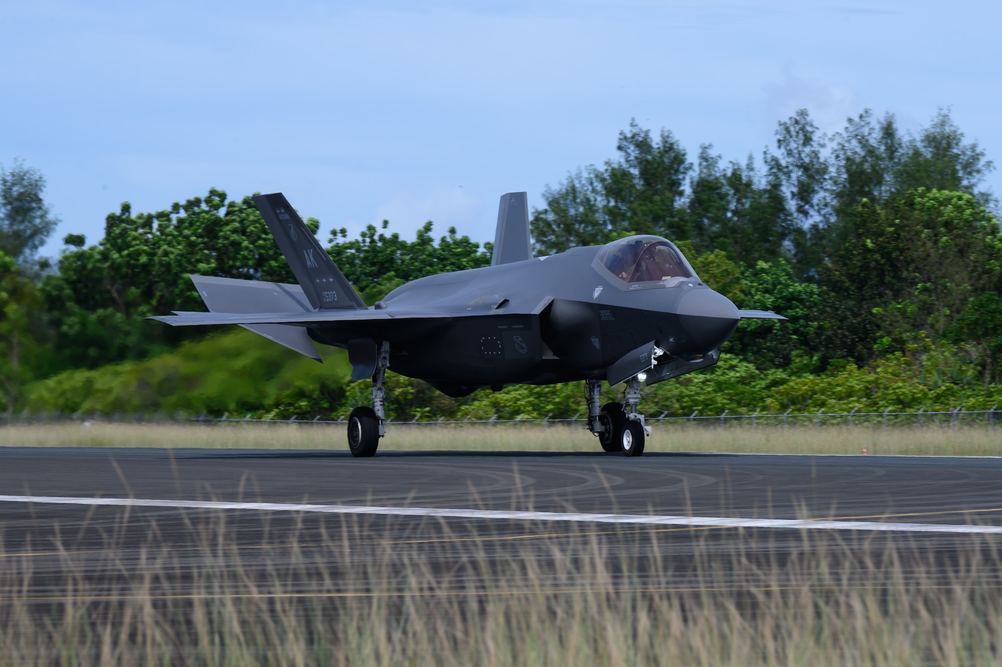 A U.S. Air Force F-35A Lightning II assigned to the 356th Expeditionary Fighter Squadron, 354th Air Expeditionary Wing, taxis on the runway upon initial arrival at Palau International Airport in support of Valiant Shield 22, June 11, 2022. VS22 is the ninth iteration of the series that began in 2006. It is a field training exercise that aims to prepare the Joint Force to rapidly respond to crises and contingencies across the spectrum of operations from humanitarian assistance and disaster relief to armed conflict. (U.S. Air Force photo by Senior Airman Jose Miguel T. Tamondong)