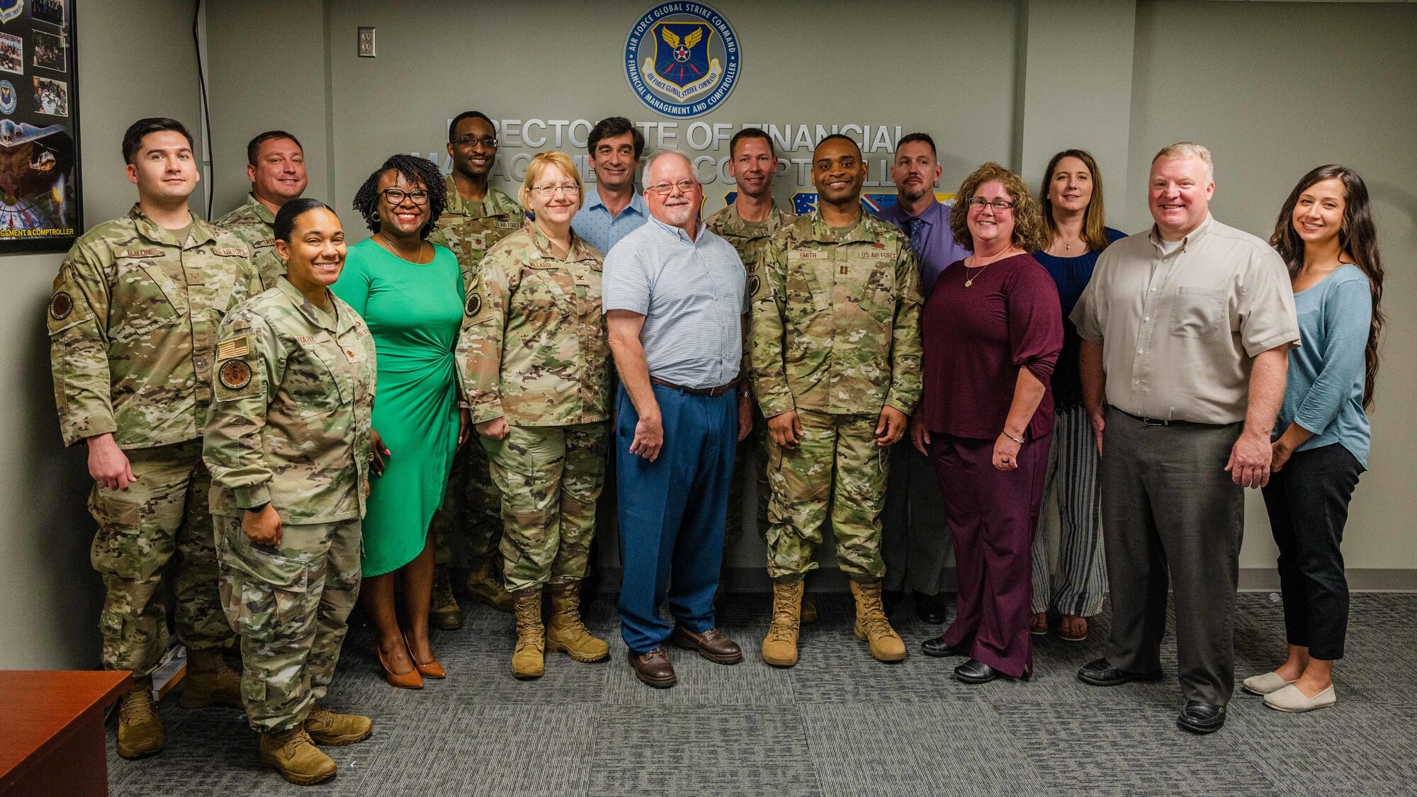 The Air Force Global Strike Command Financial Management team stands for a group photo at Barksdale Air Force Base, Louisiana, June 13, 2022.