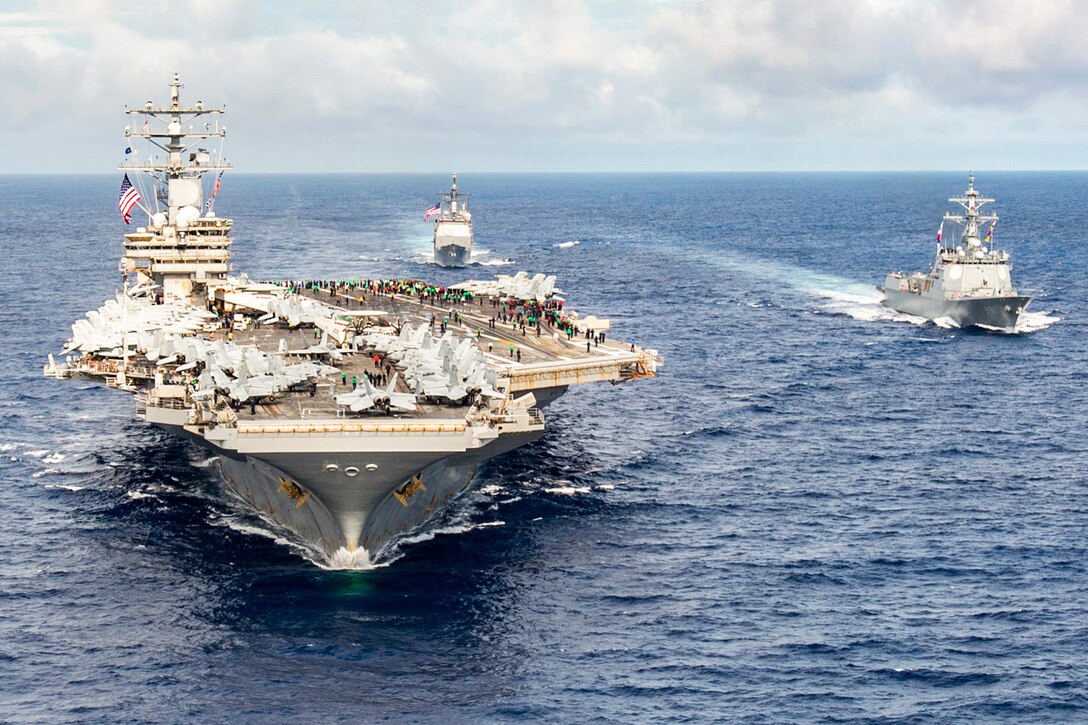 The USS Ronald Reagan and South Korean vessels sail in formation.