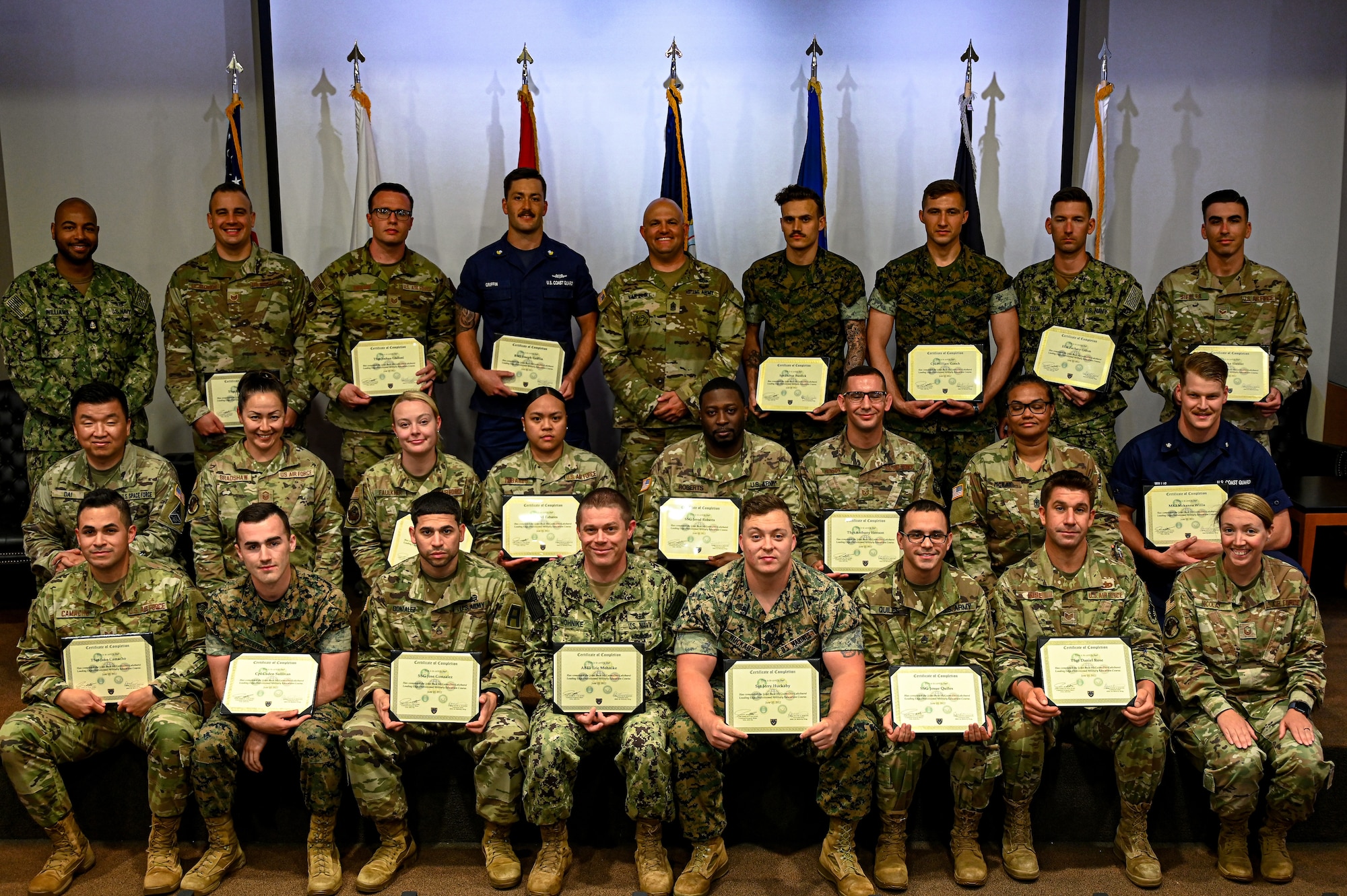 The graduating class of the Leading Edge Joint Service Seminar, at Joint Base McGuire-Dix-Lakehurst, June 10, 2022. Members from five different branches attended the weeklong seminar to focus on debunking inter-service cultural myths, talent management, ethical dilemmas, and discussions about our nation’s adversaries. (U.S. Air Force photo by Staff Sergeant Sabatino DiMascio)