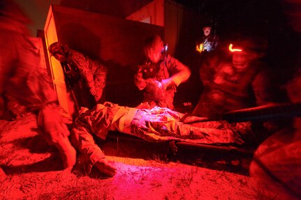 U.S. Army medics assigned to the South Carolina Army National Guard, conduct combat medical training during a sensory deprivation exercise