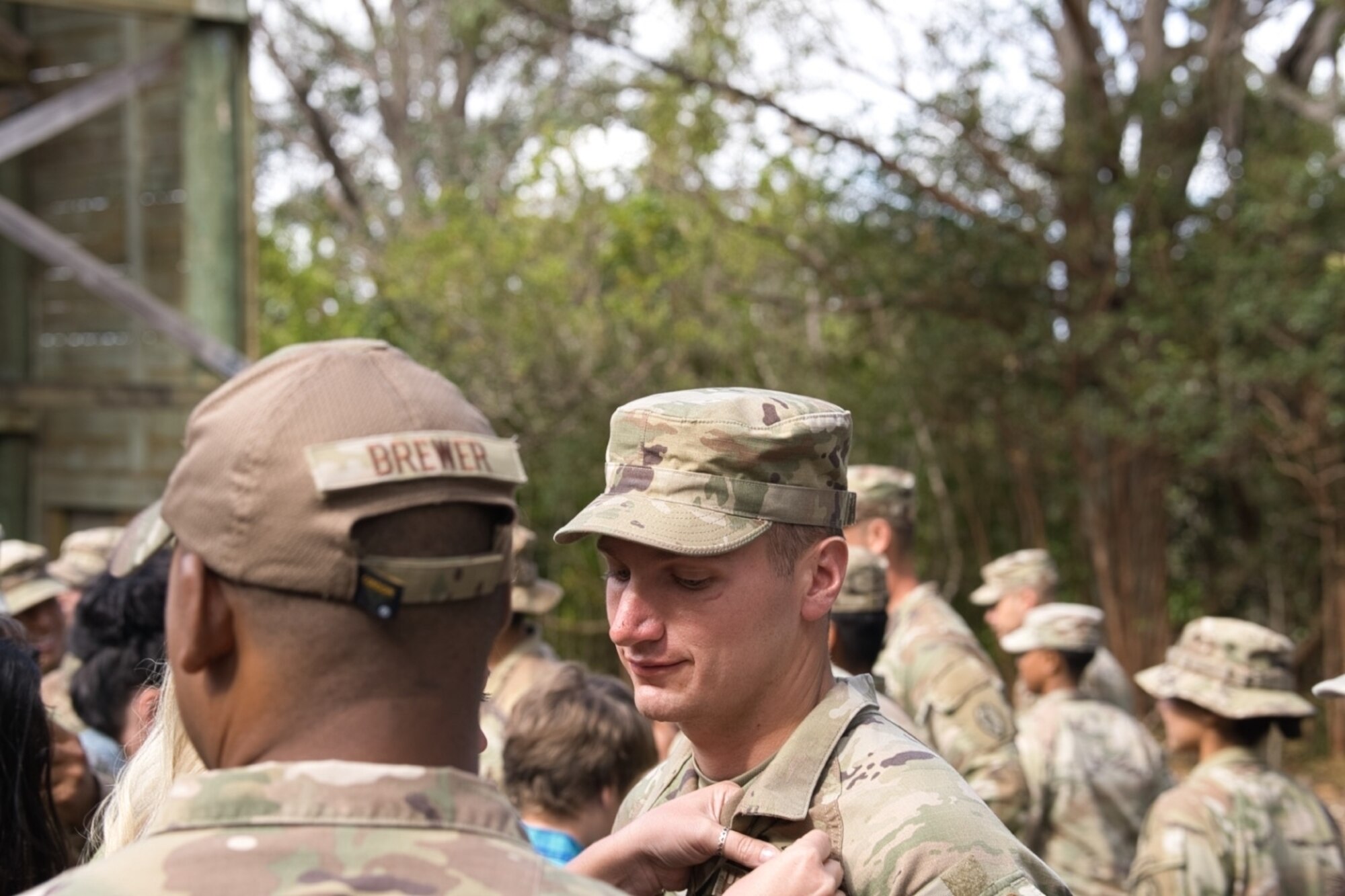 Lt. Col. Michael Brewer, 747th Cyberspace Squadron commander, congratulates Senior Airman Caden Woodson, 747th CS front-end software developer, on earning the Air Assault Badge after graduating Army Air Assault School at Lightning Academy, Hawaii, April 15, 2022. Completing this course as a Cyber Airman embodied the spirit of being a Multi-Capable Airman and expanded his skillset outside of his core AFSC. (Courtesy Photo)