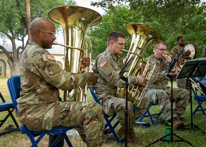 Members of Fort Sam’s Own 323d Army Band perform prior  to the Army’s 247th birthday celebration, held at Joint Base San Antonio-Fort Sam Houston, Texas, June 14, 2022. The Army’s annual birthday celebration highlights total force history and tradition, and commemorates the continuous commitment to defending America 24/7. (U.S. Army Photo by Spc. Andrea Kent)