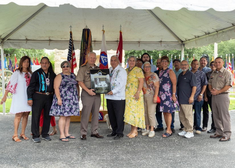 U.S. Army Lt. Gen. John R. Evans, commanding general of Army North, and Command Sgt. Maj. Phil K. Barretto, senior enlisted advisor of Army North, presents Erwin J. De Luna with a plaque inducting him into the Distinguished Quartermasters during the Army’s 247th birthday celebration, held at Joint Base San Antonio-Fort Sam Houston, Texas, June 14, 2022. Distinguished Quartermasters greatly reflect exceptional contribution to the Army mission through their tireless support to military programs and the San Antonio community. The Army’s annual birthday celebration highlights total force history and tradition, and commemorates the continuous commitment to defending America 24/7. (U.S. Army Photo by Spc. Andrea Kent)