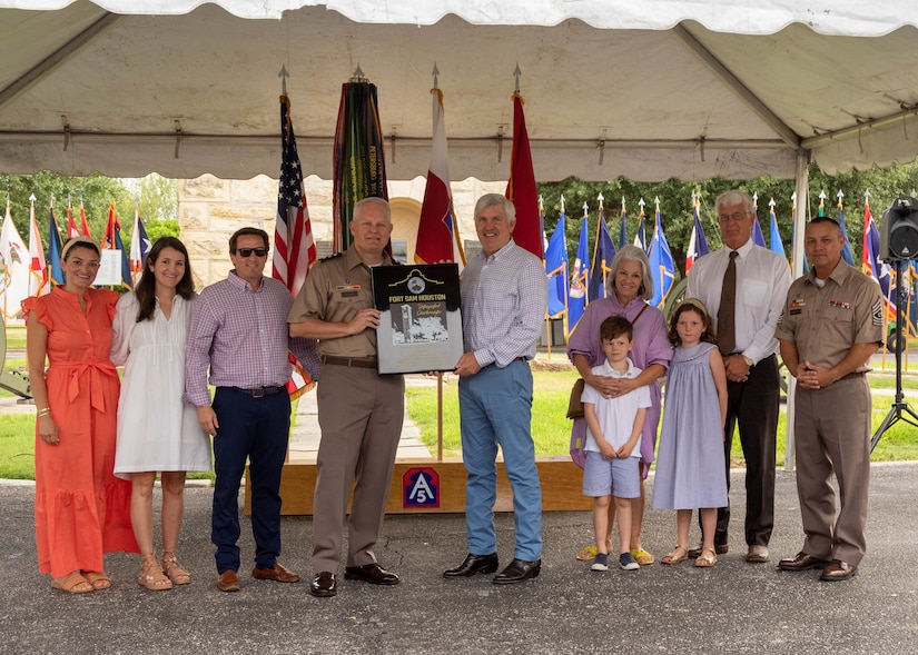 U.S. Army Lt. Gen. John R. Evans, commanding general of Army North, and Command Sgt. Maj. Phil K. Barretto, senior enlisted advisor of Army North, presents William B. Kingman with a plaque inducting him into the Distinguished Quartermasters during the Army’s 247th birthday celebration, held at Joint Base San Antonio-Fort Sam Houston, Texas, June 14, 2022. Distinguished Quartermasters greatly reflect exceptional contribution to the Army mission through their tireless support to military programs and the San Antonio community. The Army’s annual birthday celebration highlights total force history and tradition, and commemorates the continuous commitment to defending America 24/7. (U.S. Army Photo by Spc. Andrea Kent)