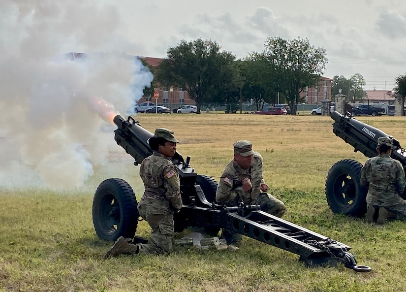 U.S. Army North Soldiers fire off cannons during the playing of the National Anthem in celebration of the U.S. Army 274th Birthday, held at Joint Base San Antonio-Fort Sam Houston, Texas, June 14, 2022. The Army Birthday celebrates our people: Soldiers, families and civilians who make defending America possible. (U.S. Army Photo by Bethany Huff)