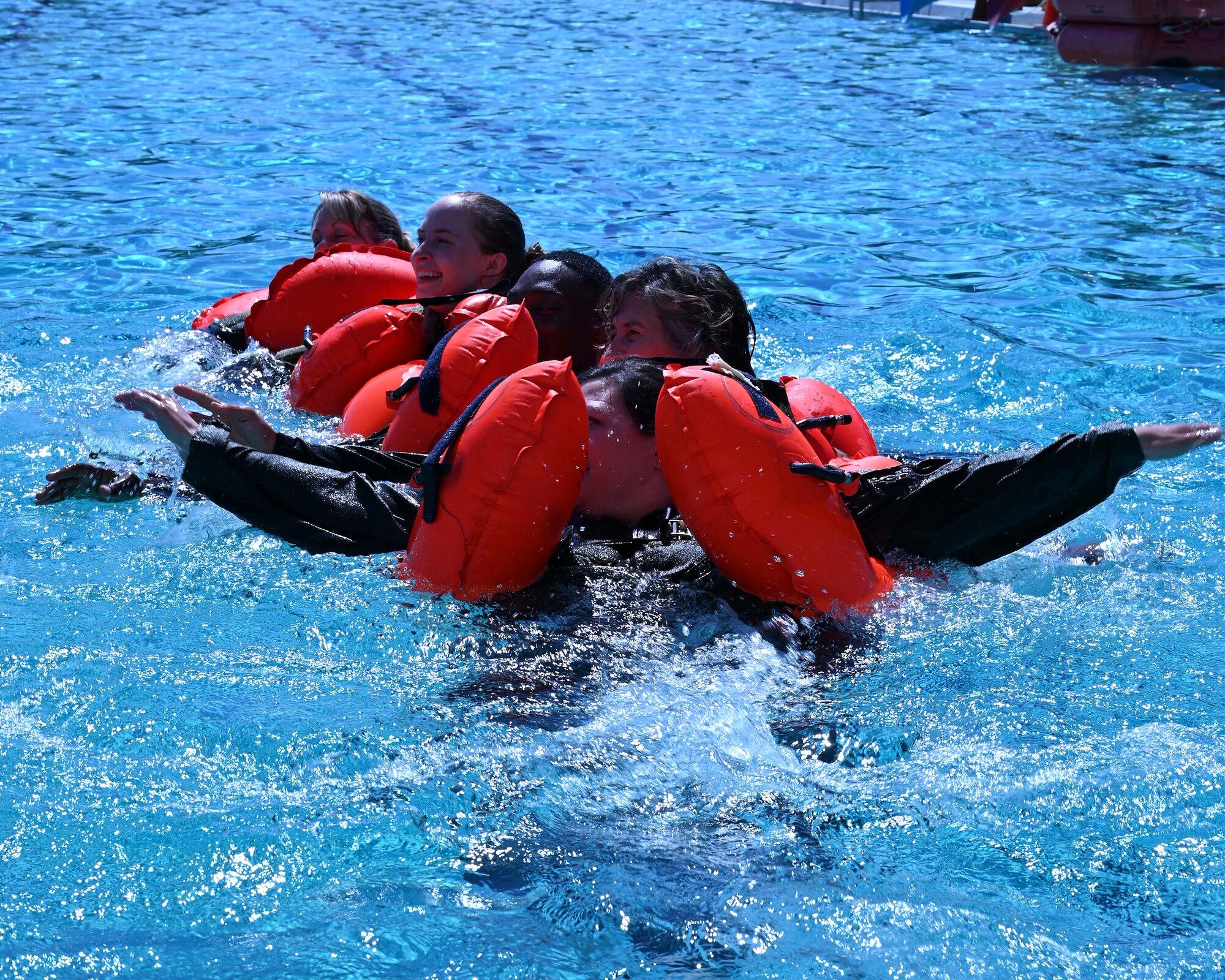 members swim together