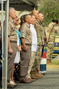 U.S. Army Lt. Gen. John R. Evans, commanding general of Army North, Command Sgt. Maj. Phil K. Barretto, senior enlisted advisor of Army North, and others sing the Army song at the end of the Army’s 247th birthday celebration, held at Joint Base San Antonio-Fort Sam Houston, Texas, June 14, 2022. The Army’s annual birthday celebration highlights total force history and tradition, and commemorates the continuous commitment to defending America 24/7. (U.S. Army Photo by Spc. Andrea Kent)