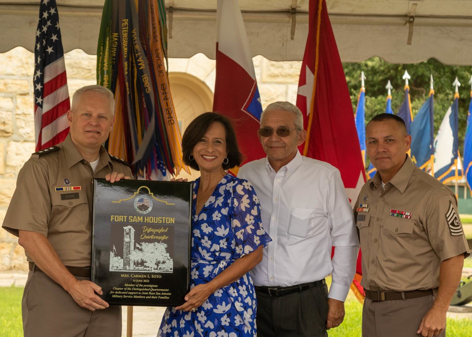 .S. Army Lt. Gen. John R. Evans, commanding general of Army North, and Command Sgt. Maj. Phil K. Barretto, senior enlisted advisor of Army North, presents Carmen L. Soto with a plaque inducting her into the Distinguished Quartermasters during the Army’s 247th birthday celebration, held at Joint Base San Antonio-Fort Sam Houston, Texas, June 14, 2022. Distinguished Quartermasters greatly reflect exceptional contribution to the Army mission through their tireless support to military programs and the San Antonio community. The Army’s annual birthday celebration highlights total force history and tradition, and commemorates the continuous commitment to defending America 24/7. (U.S. Army Photo by Spc. Andrea Kent)