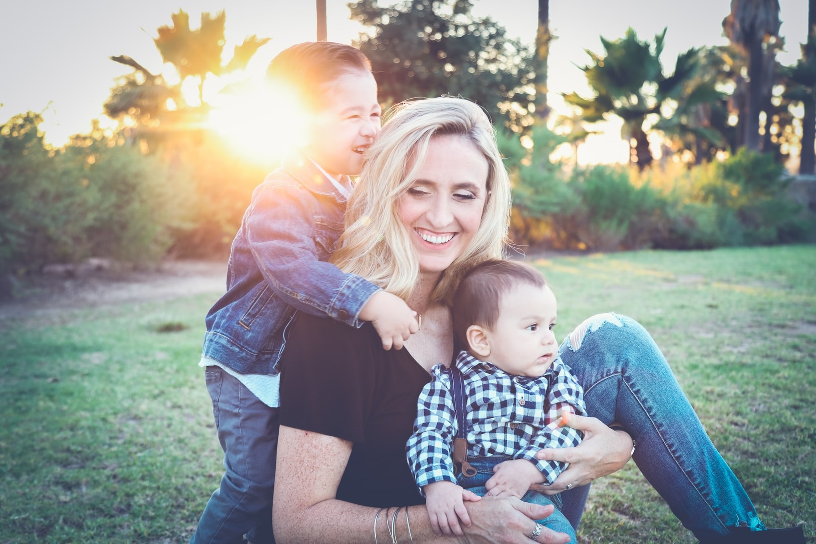 Mother playing with two children