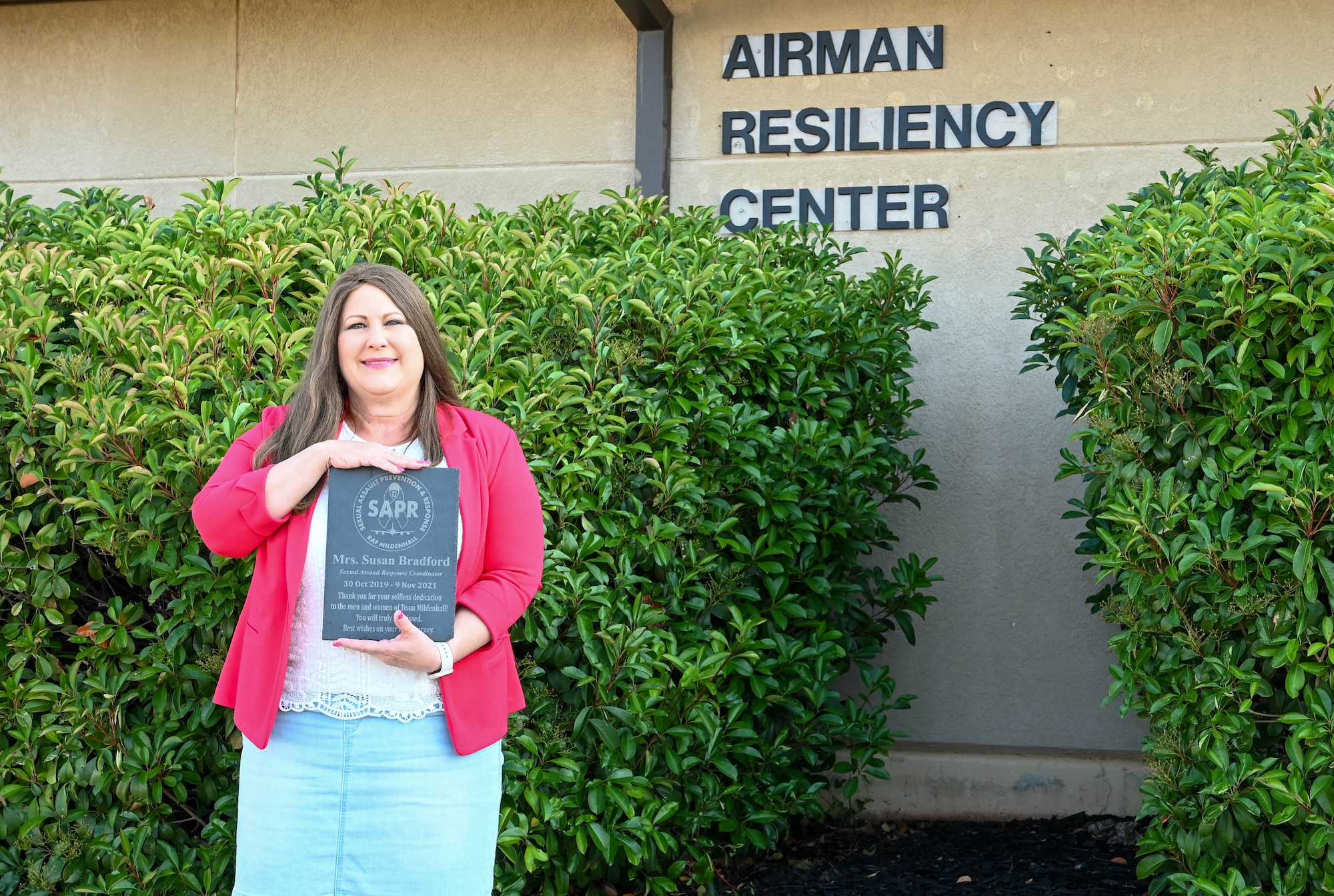 Susan Bradford, 97th Air Mobility Wing violence prevention integrator (VPI), poses for a photo at Altus Air Force Base (AAFB), Oklahoma, June 9, 2022. Bradford was a Sexual Assault Prevention and Response advocate before becoming the VPI at AAFB. (U.S. Air Force photo by Senior Airman Kayla Christenson)
