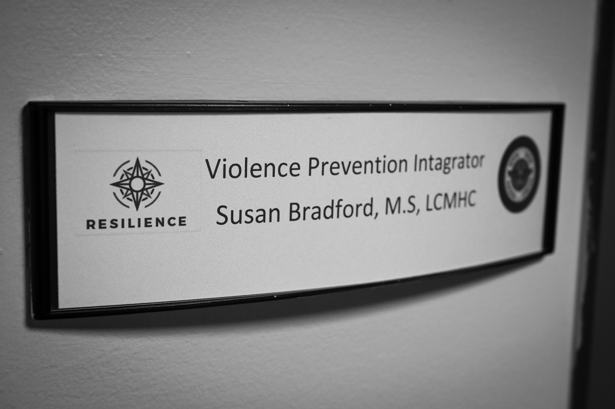 A sign is displayed outside the office of Susan Bradford, 97th Air Mobility Wing violence prevention integrator (VPI), at Altus Air Force Base (AAFB), Oklahoma, June 9, 2022. Bradford has been the VPI at AAFB for six months and has added over 10 members to the Wellness Advocacy Team. (U.S. Air Force photo by Senior Airman Kayla Christenson)