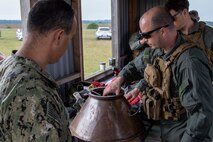 Capt. Cameron Chen, Commodore, Commander Task Force (CTF) 68, visits with Marines assigned to Expeditionary Exploitation Unit (EXU) 1 during exercise BALTOPS 22, June 09, 2022.