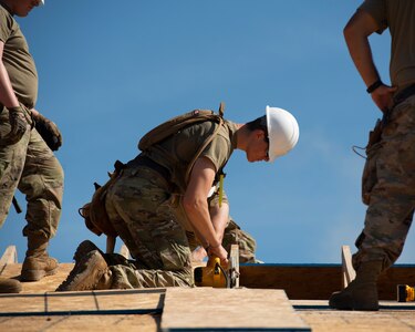 Pfc. John Beckman, a carpentry and masonry specialist with the 2120th Engineer Company, participates in the Cherokee Nation Civil Engineering Innovative Readiness Training June 9, 2022, in Tahlequah, Oklahoma. Air and Army National Guard members work in two-week rotations from April to August, building seven homes each year for low-income or homeless military veterans of Cherokee Nation.