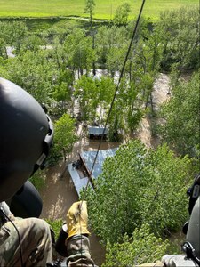 Montana National Guard aircrews search for flood victims June 13-14 in South Central Montana. At least a dozen people were rescued.