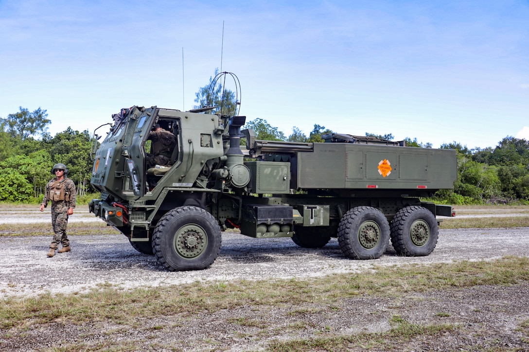 U.S. Marine Corps Cpl. Jonathan BloodWorth, a field artillery cannoneer with 5th Battalion, 11th Marine Regiment, 1st Marine Division, conducts vehicle checks prior to a High-Mobility Artillery Rocket System launch in support of exercise Valiant Shield 2022t on Angaur, Palau, June 8, 2022. Exercise such as Valiant Shield allows the Indo-Pacific Command Joint Forces the opportunity to integrate forces from all branches of service to conduct precise, lethal, and overwhelming multi-axis, multi-domain effects that demonstrate the strength and versatility of the Joint Force and our commitment to a free and open Indo-Pacific.
