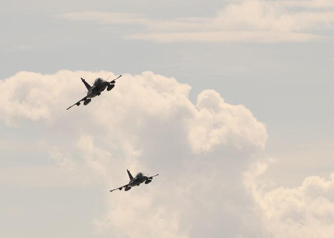 Two Swedish JAS-39 Gripen fighter aircraft fly above the Baltic Sea, June 13, 2022, during exercise BALTOPS22.