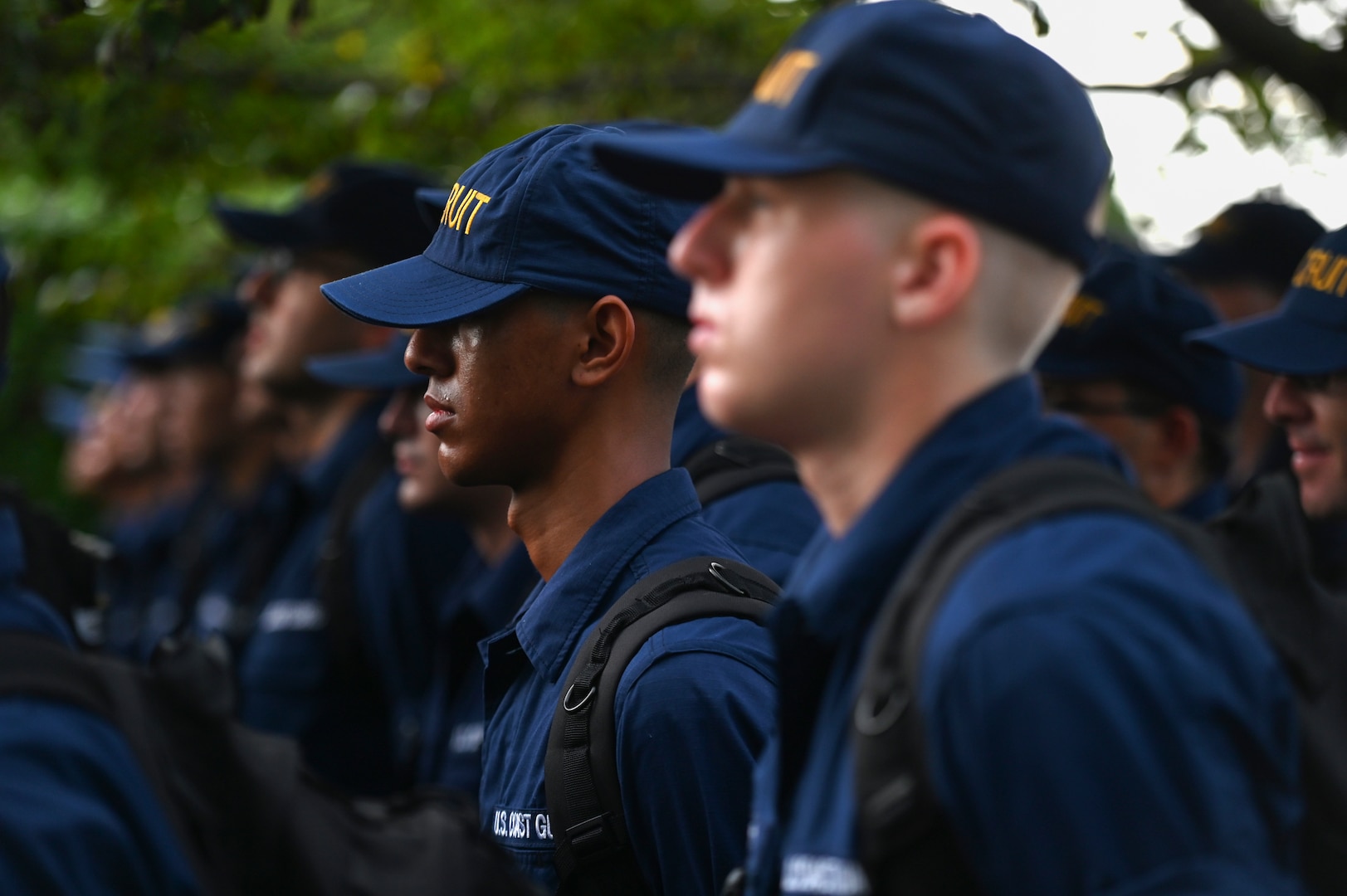 Coast Guard recruits in company Delta-201 receive orders to their first duty stations at the Fisherman’s Memorial in Cape May, New Jersey.