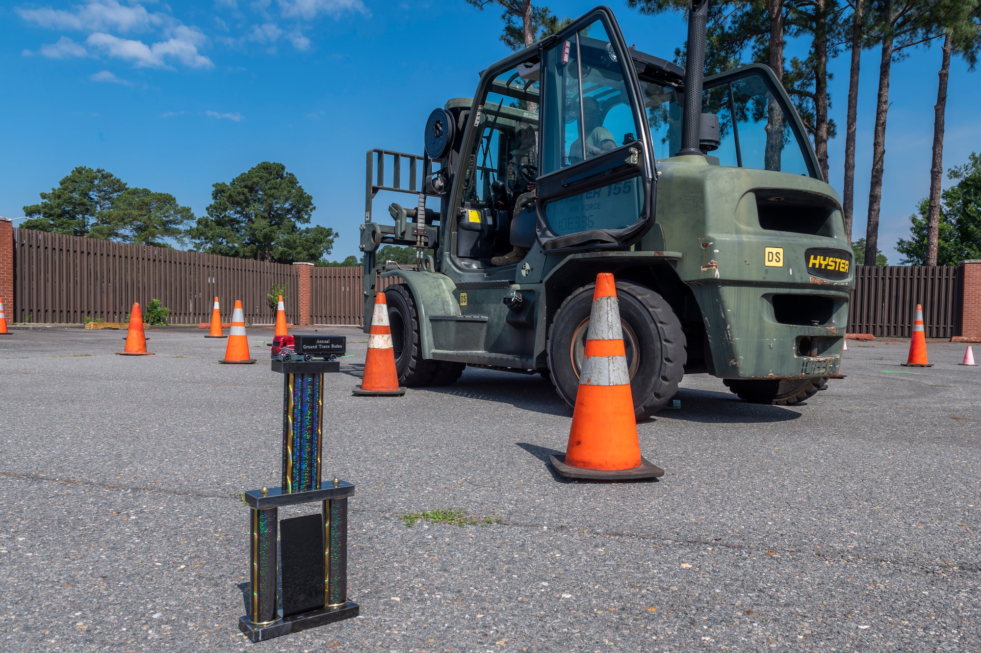 The Airmen competed in teams of two in four different obstacle courses to win the trophy. (U.S. Air Force photo by Kylie Barrow)