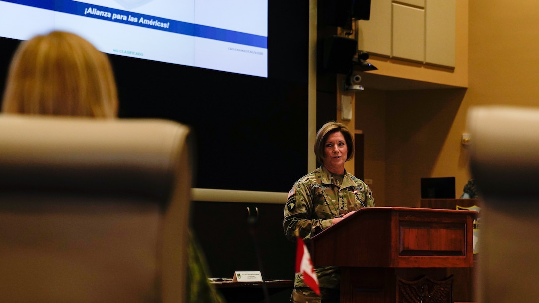 Army Gen. Laura Richardson, the commander of U.S. Southern Command, addresses attendees of the SOUTHCOM Senior Leader Logistics Symposium.